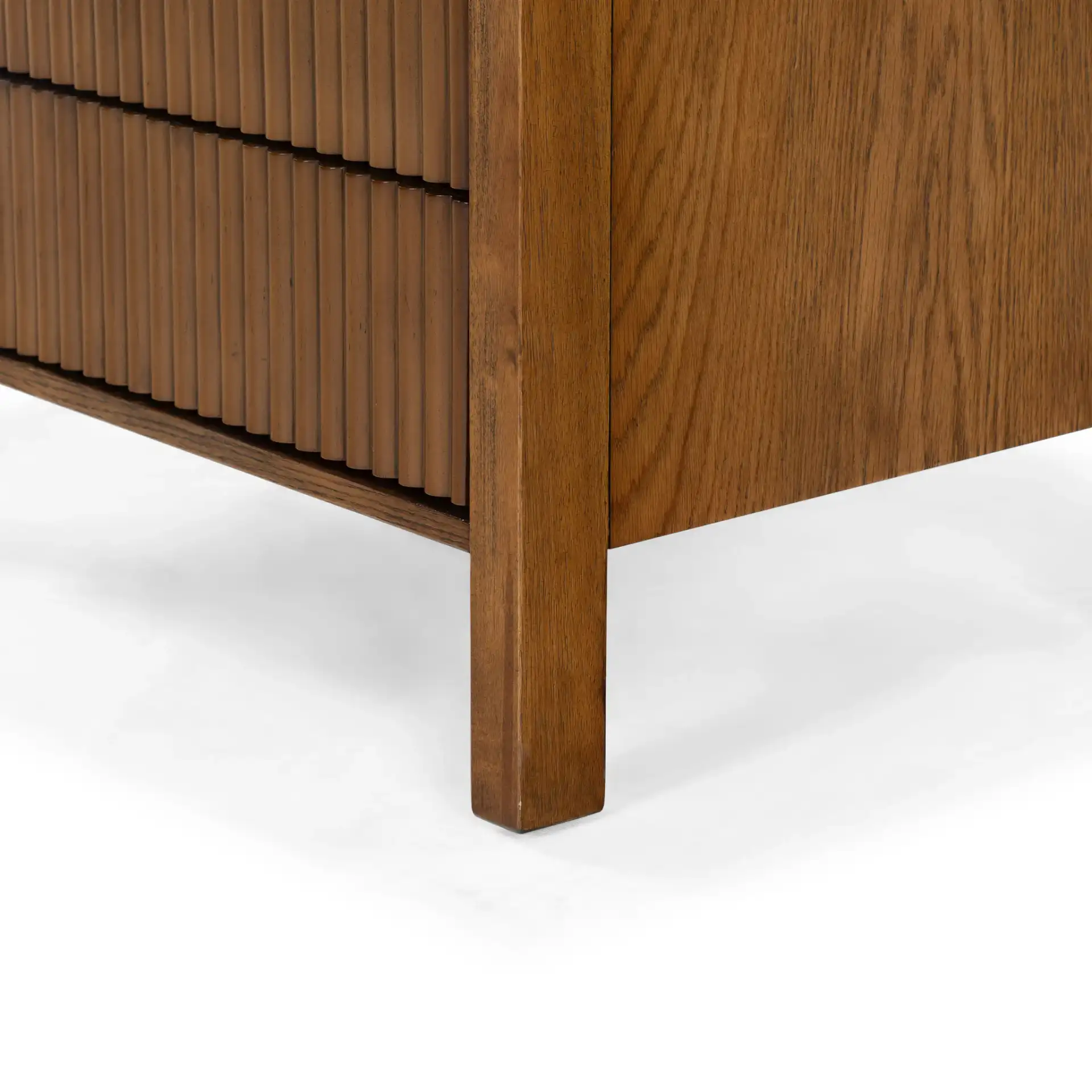 Shelbie Two-Drawer Nightstand in Medium Oak in a styled room