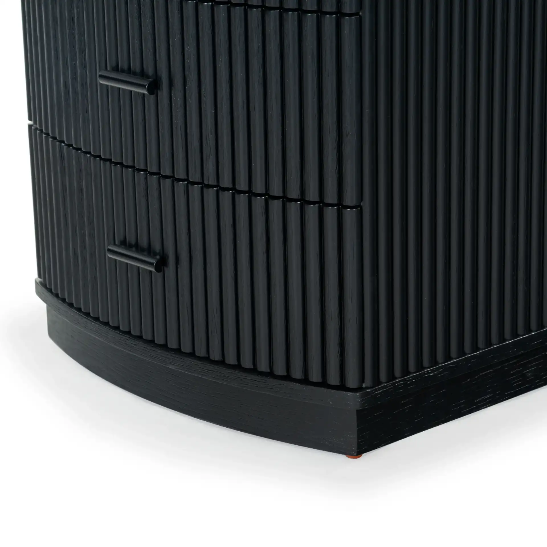 Shelbie Three-Drawer Nightstand in Black in a styled room