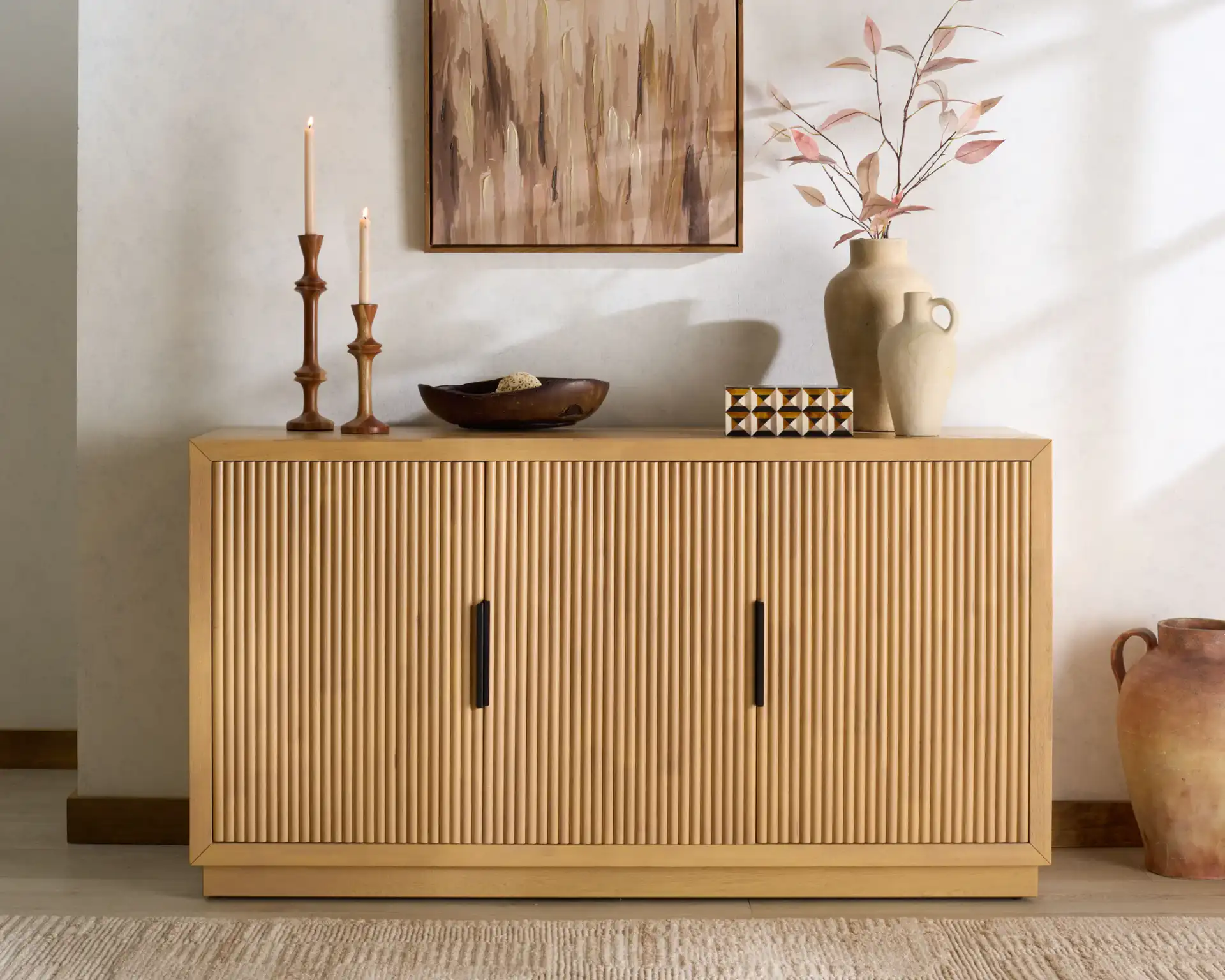 Shelbie Three-Door Reeded Sideboard in Oak / Black in a styled room