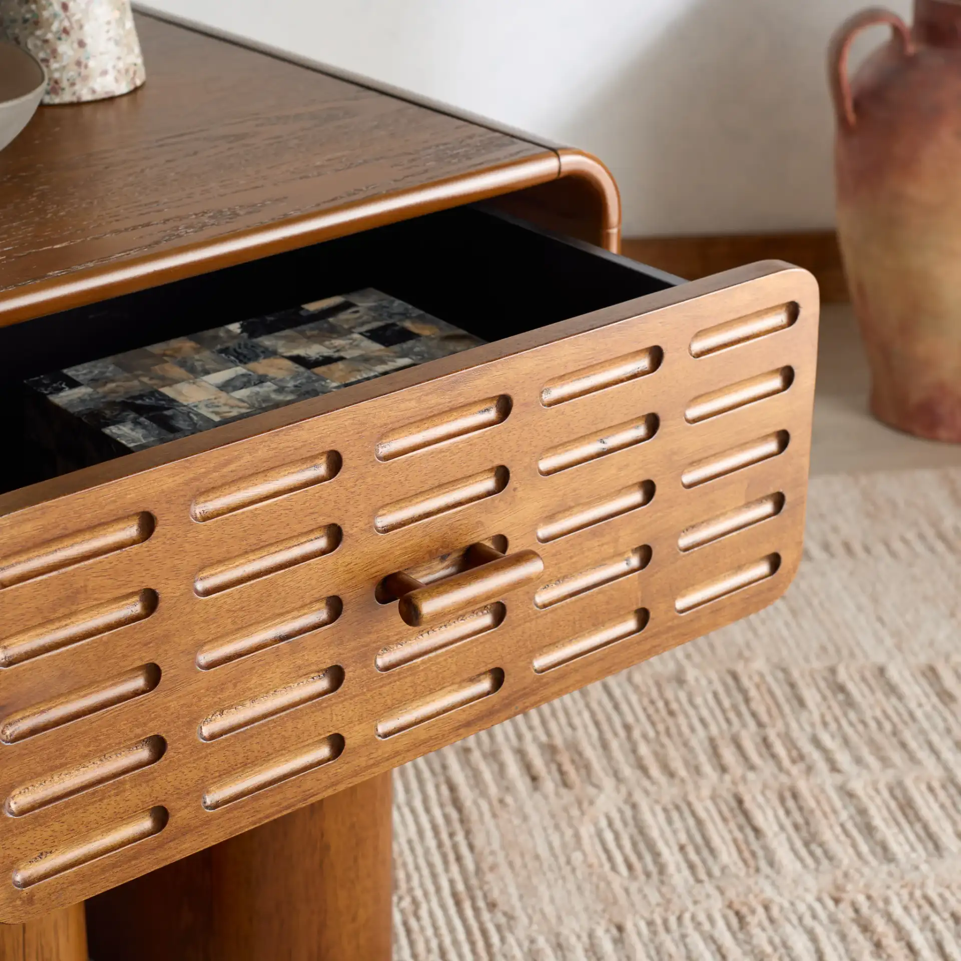 Torricelli One-Drawer Nightstand in Medium Oak in a styled room