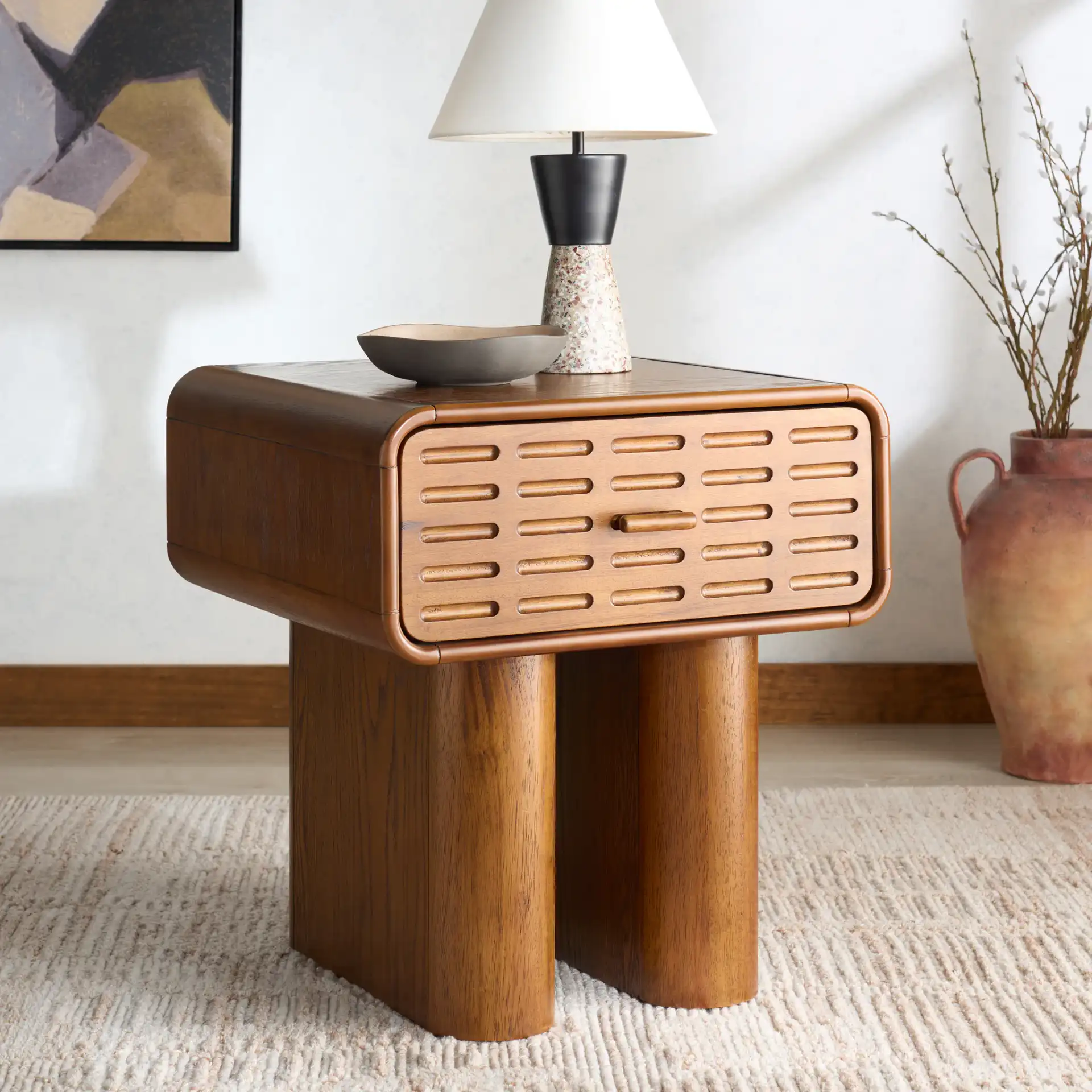Torricelli One-Drawer Nightstand in Medium Oak in a styled room