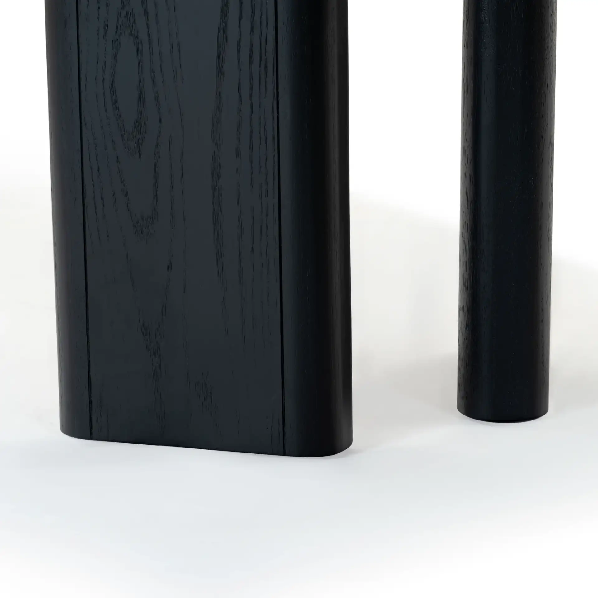 Barnard Rectangular Wood Dining Table in Black in a styled room