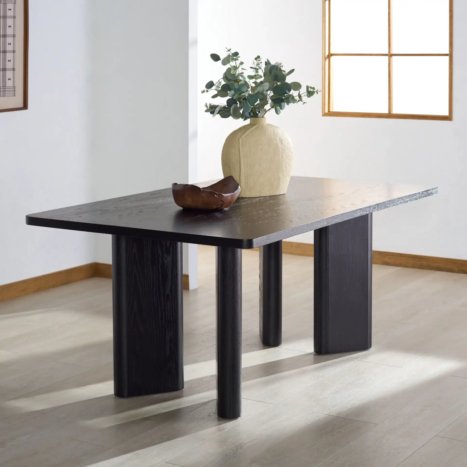 Barnard Rectangular Wood Dining Table in Black in a styled room
