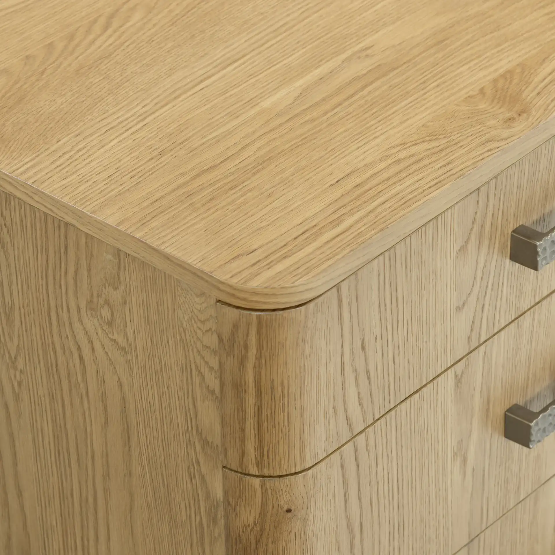 Carmilla Three-Drawer Nightstand in Dark Brown Oak in a styled room