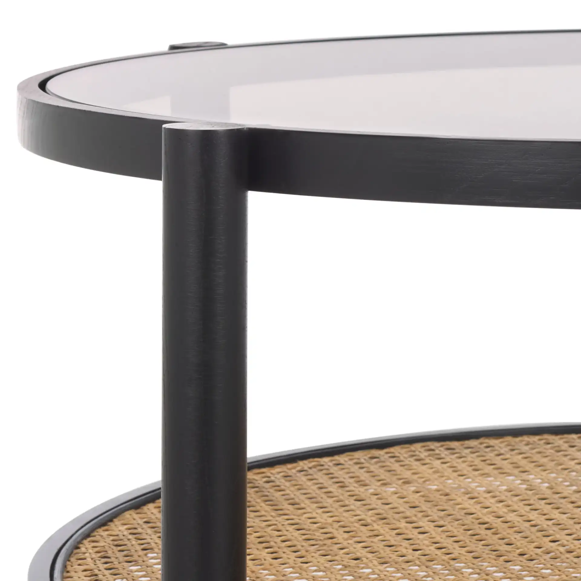 Karyna Rattan & Glass Table in Black / Natural in a styled room