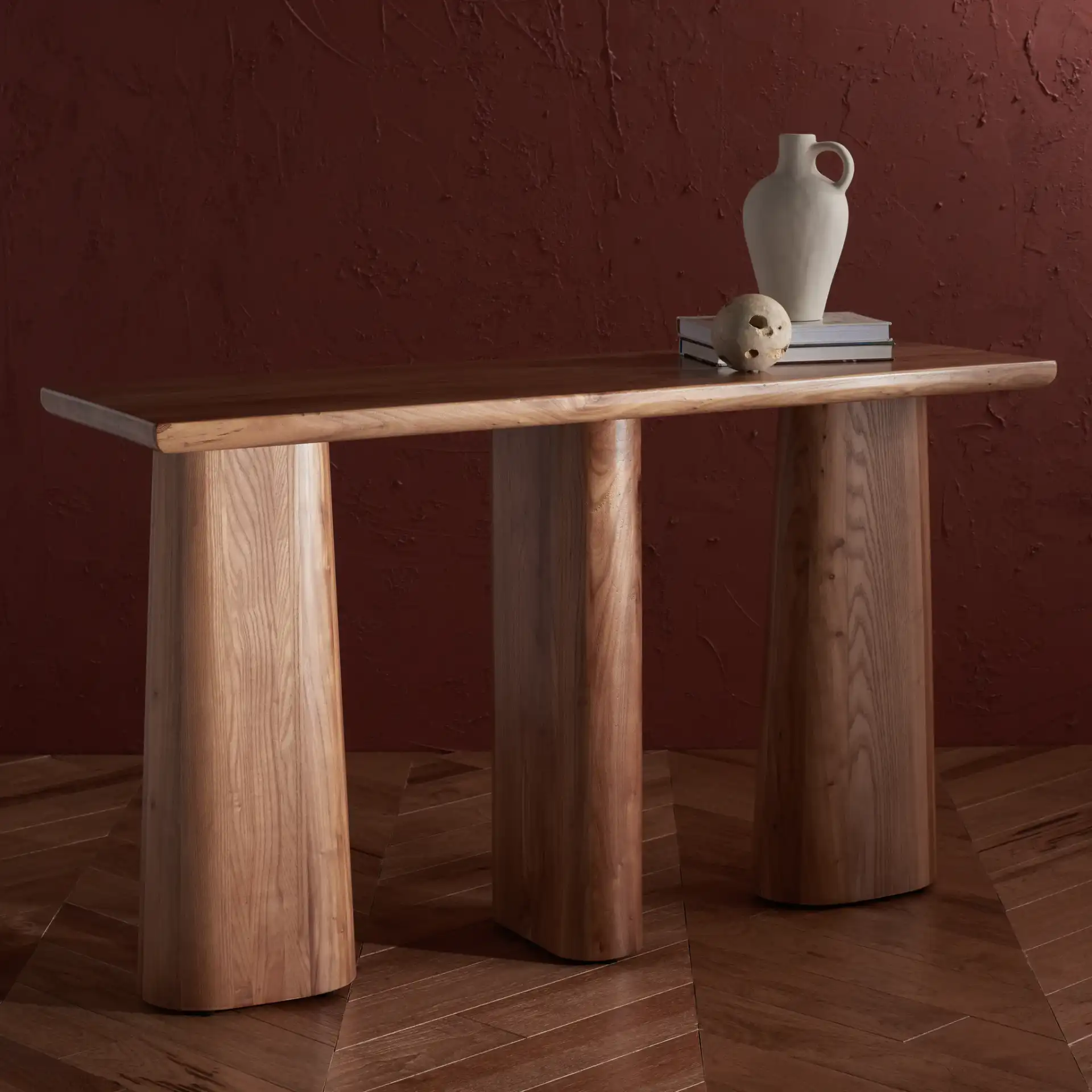 Ryllae Wood Console Table in Walnut in a styled room
