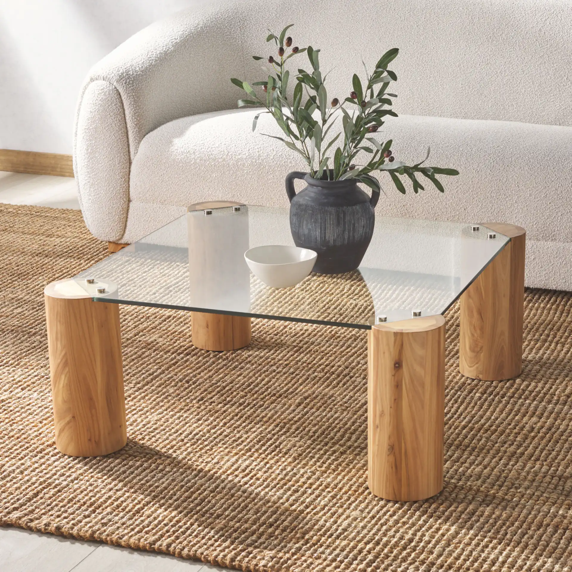 Robbie Square Glass Coffee Table in Natural in a styled room