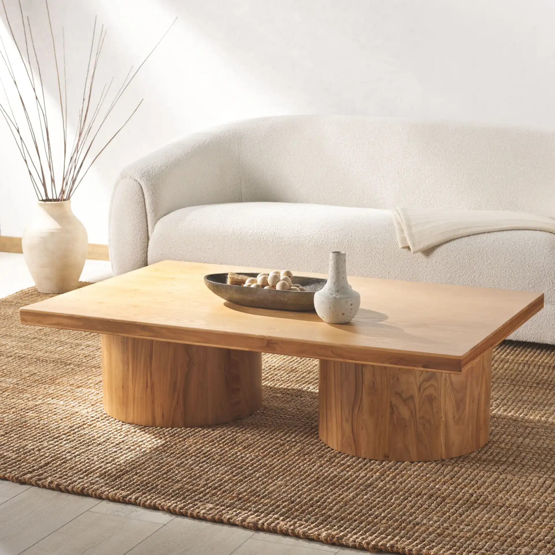 Falynn Square Wood Coffee Table in Black in a styled room