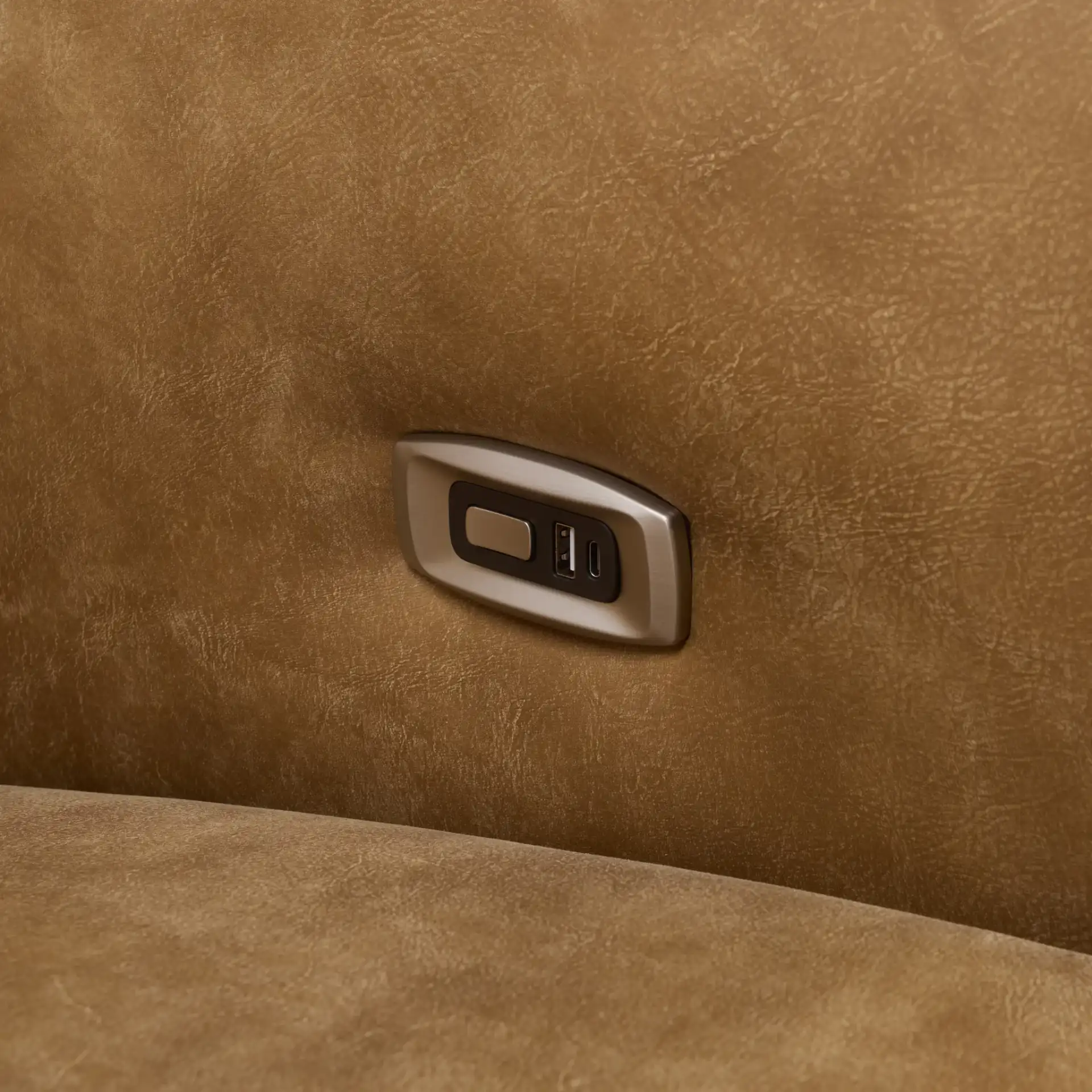 Doug Leather Reclining Sofa in Brown in a styled room