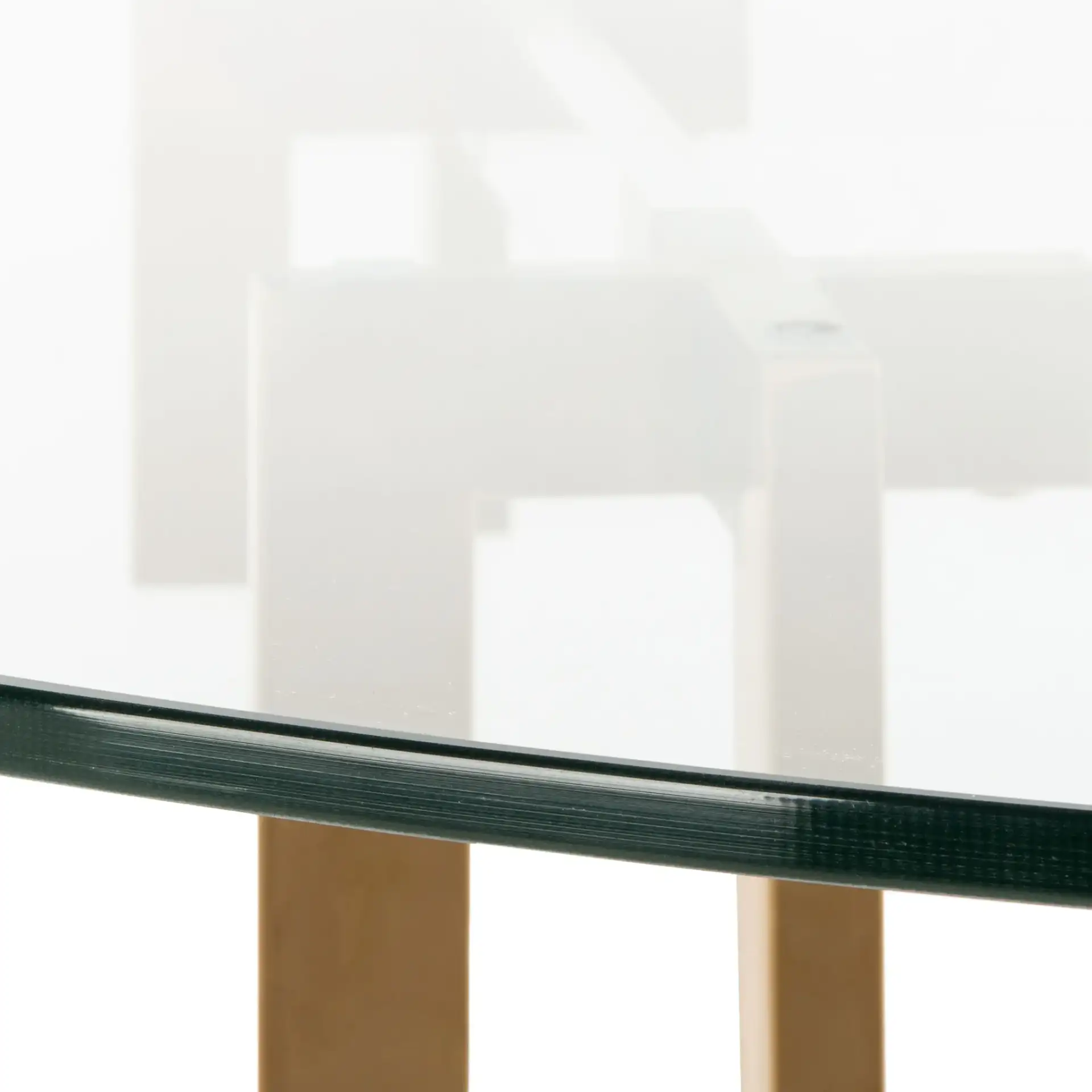 Koryn Round Dining Table in Clear / Brass in a styled room