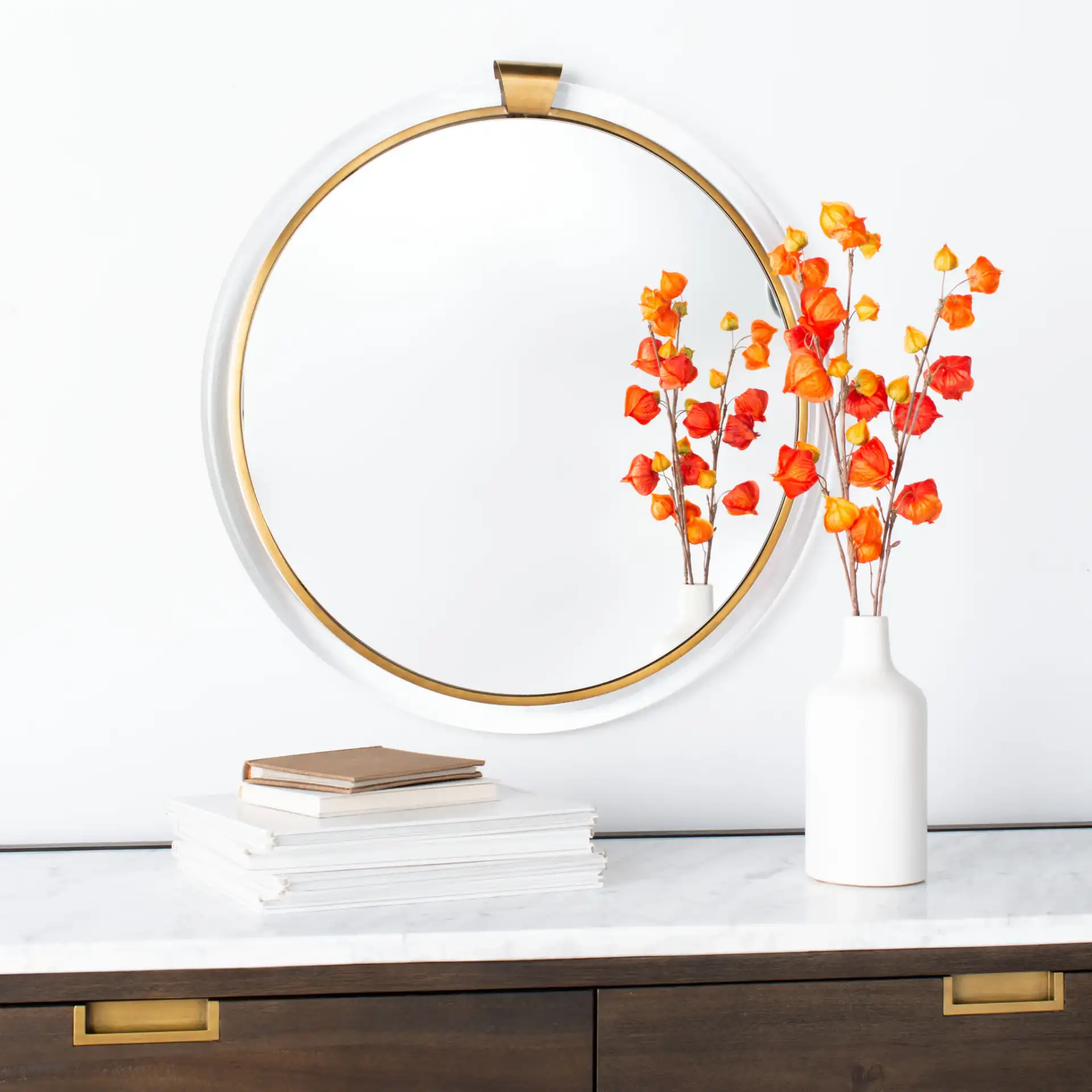 Donzel Mirror in Brass in a styled room
