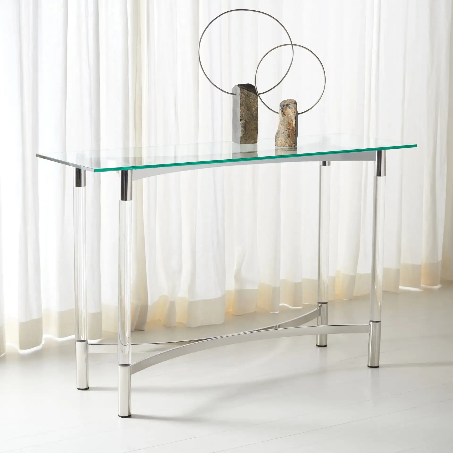 Letty Acrylic Console Table in Silver in a styled room