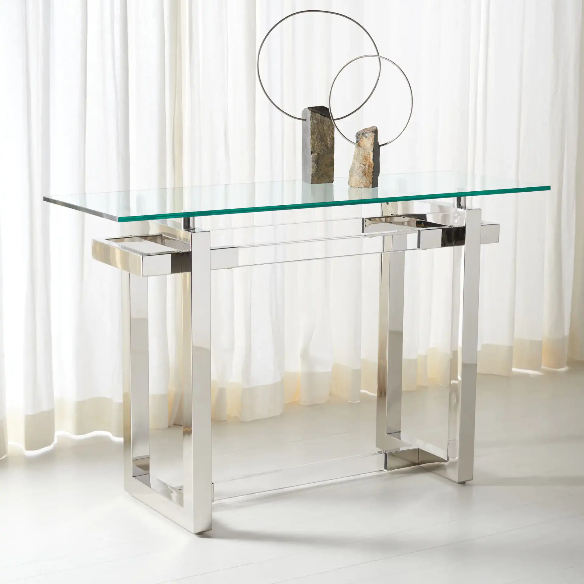 Montrelle Acrylic Console Table in Silver in a styled room