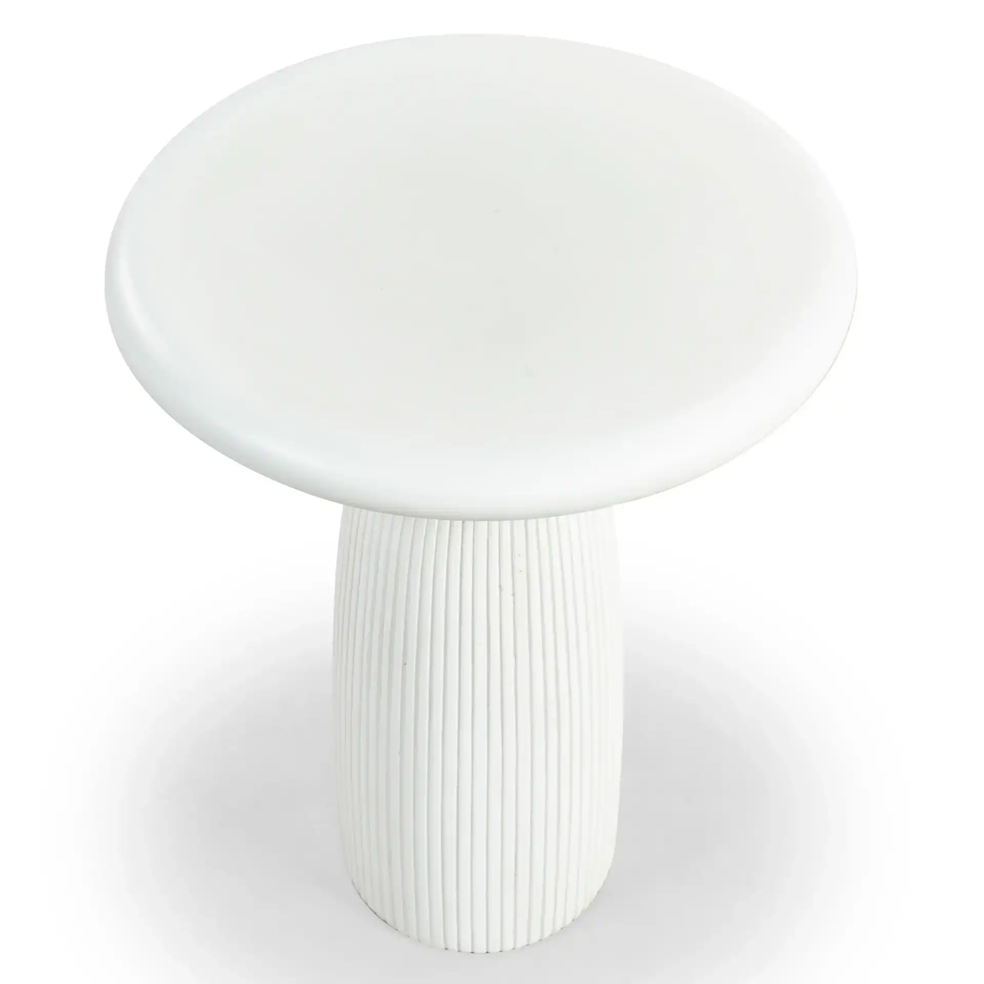 Oskar Round Concrete Accent Table in Brown in a styled room
