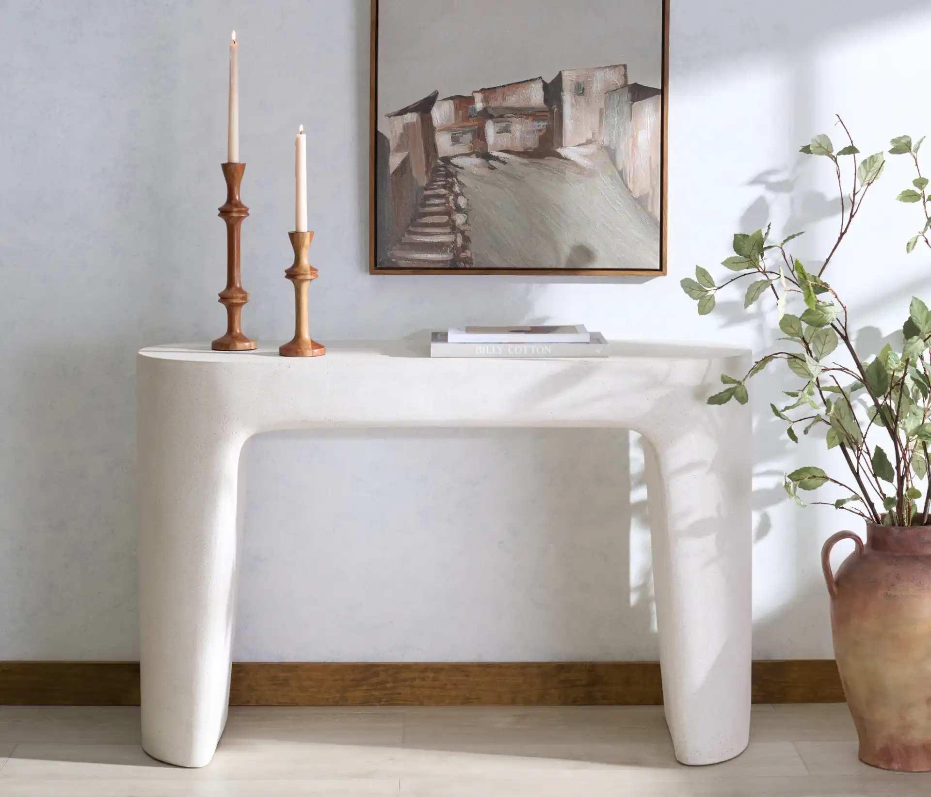 Tolbert Concrete Console Table in Ivory in a styled room
