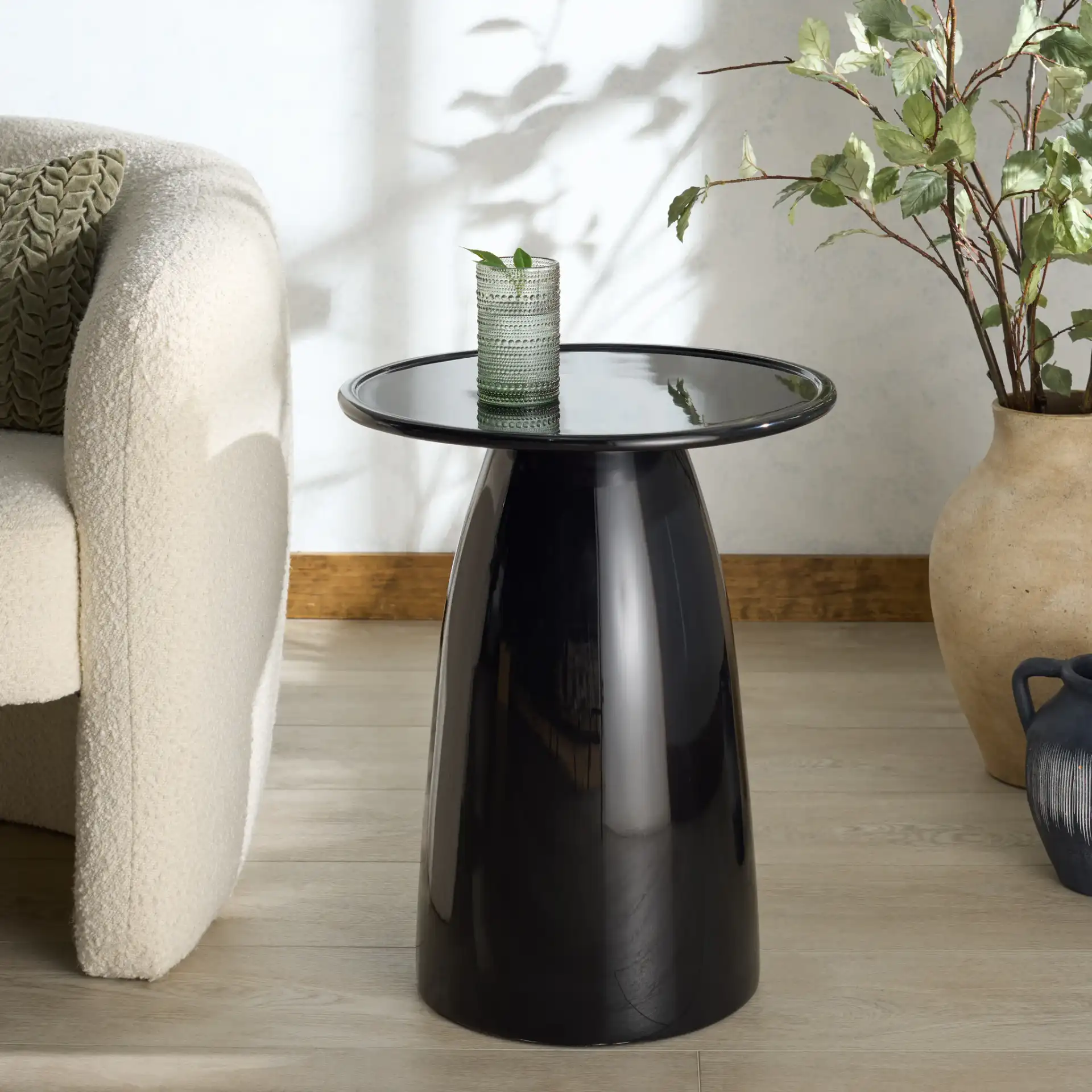Stephan Concrete Accent Table in Black in a styled room