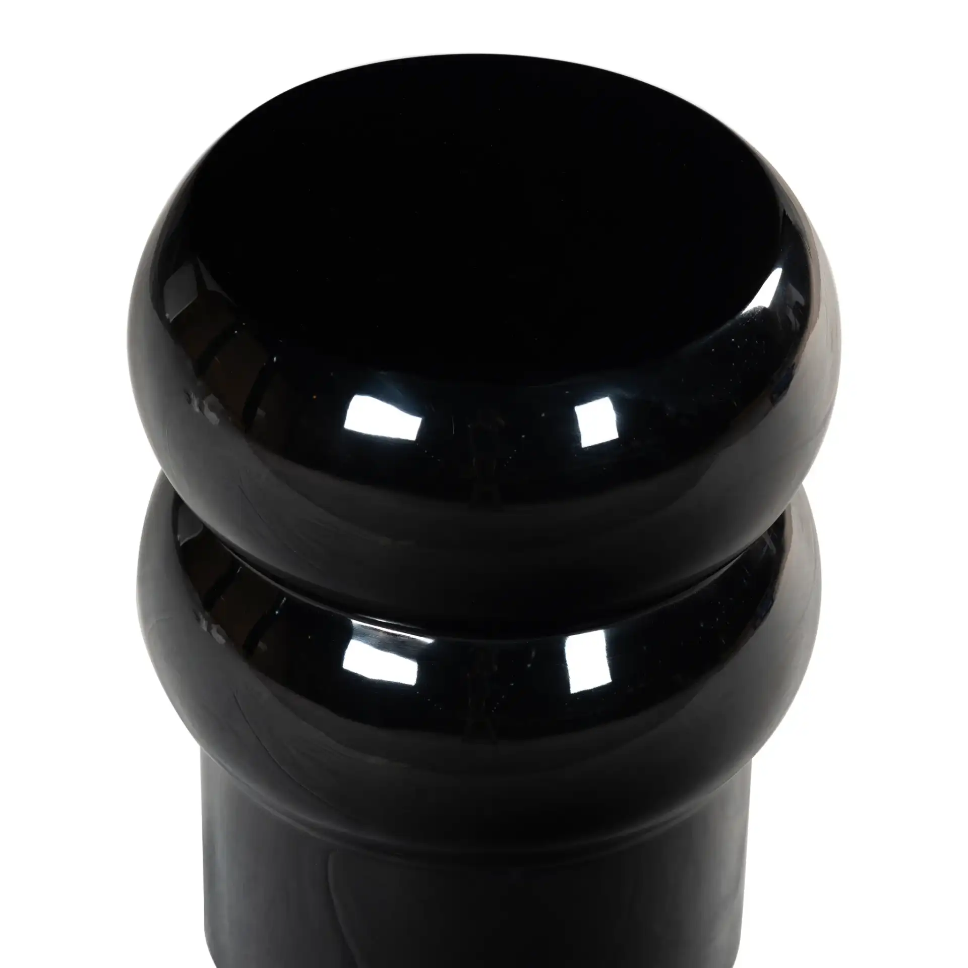 Joyrosa Concrete Accent Table in Black in a styled room