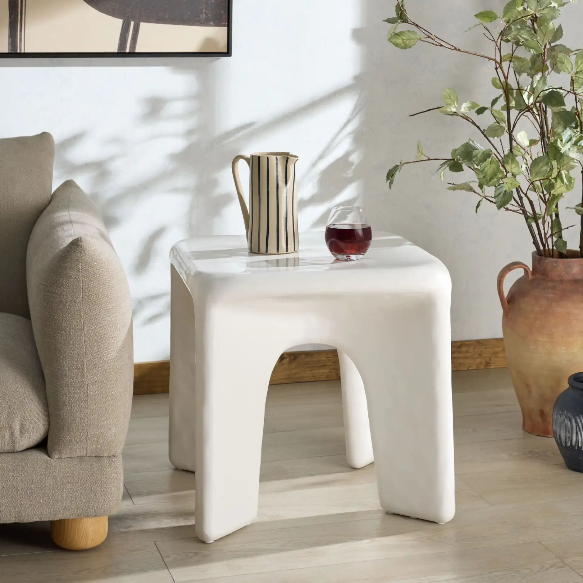 Mayalin Square Accent Table in White in a styled room