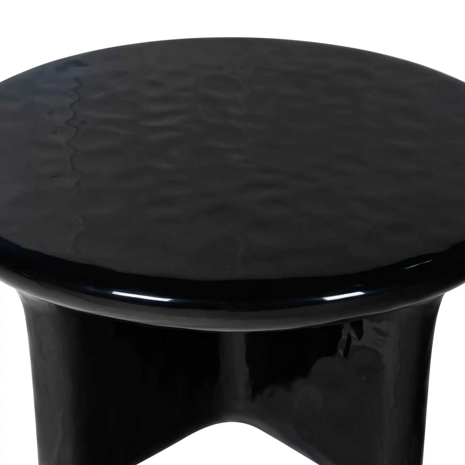 Tressarose Round Coffee Table in Black in a styled room