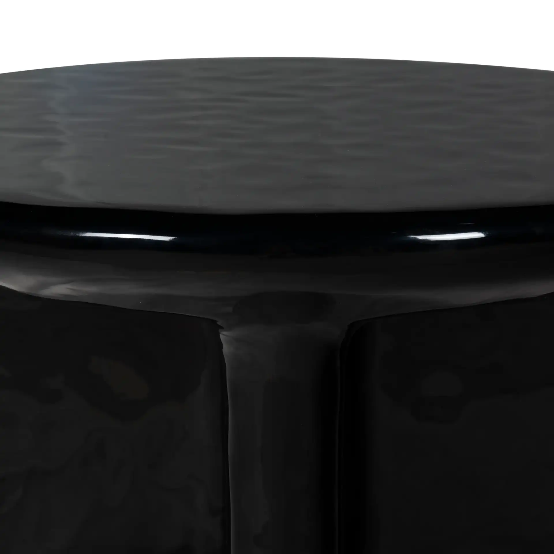 Tressarose Round Coffee Table in Black in a styled room