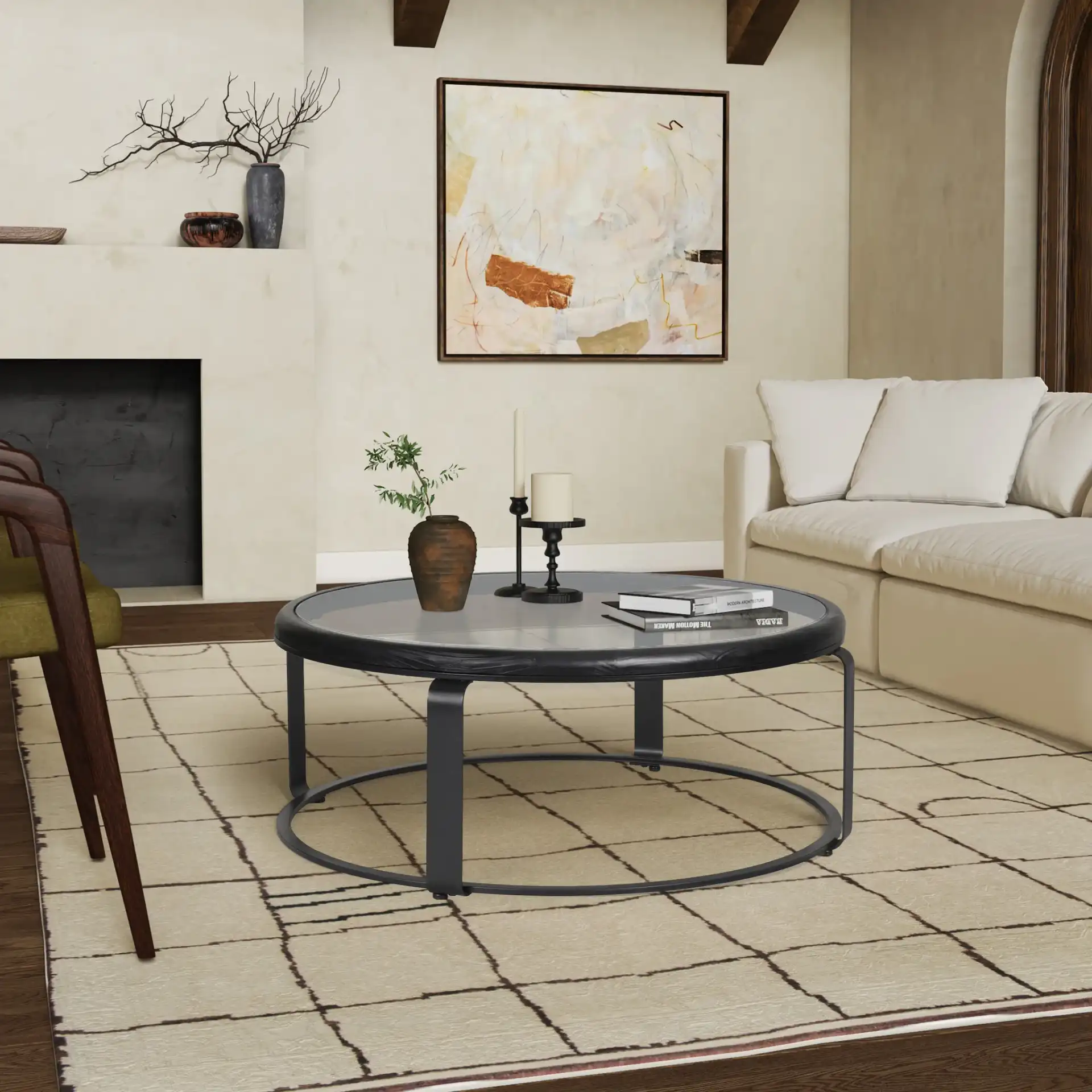 Tyrese Metal Round Coffee Table in Black / Clear in a styled room