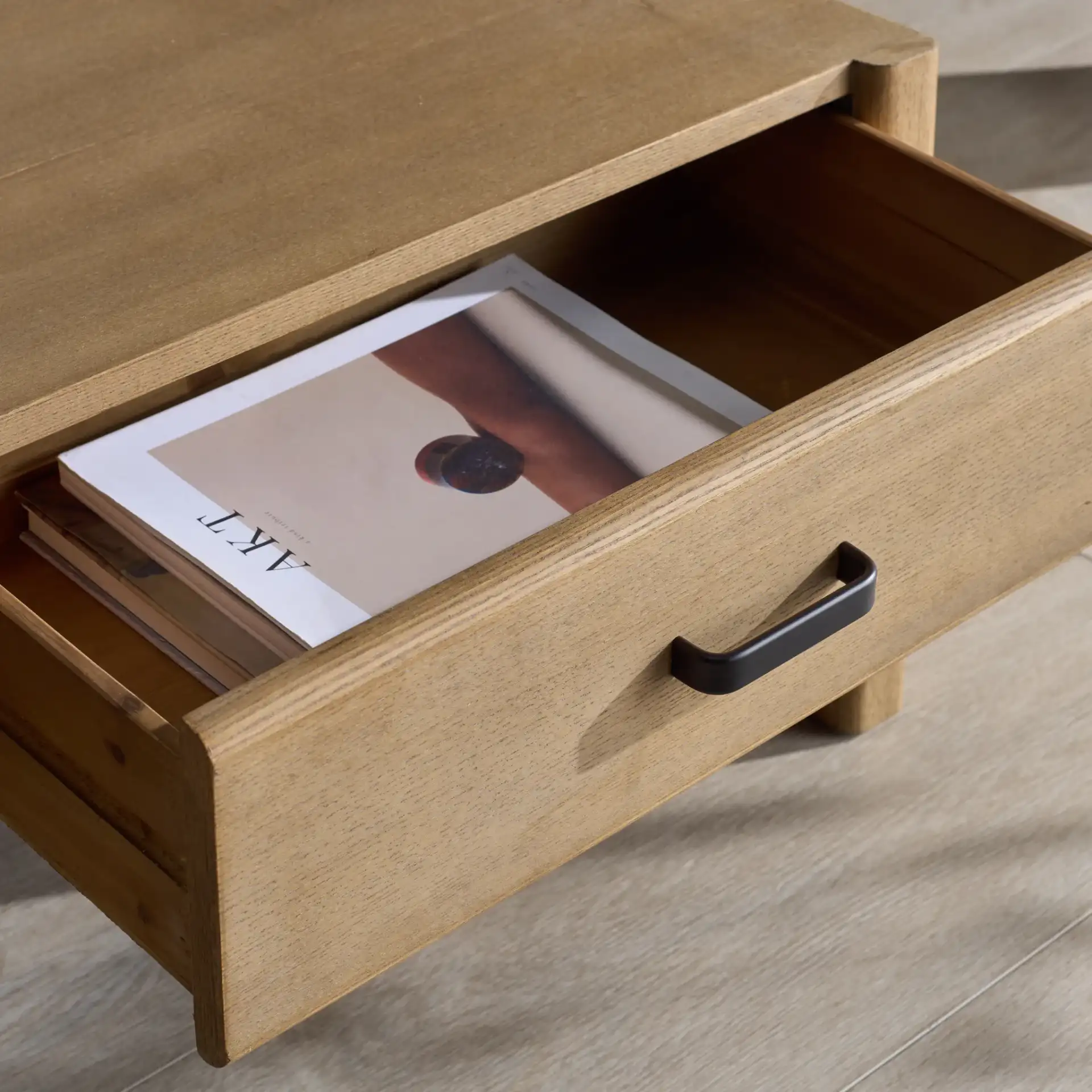 Wynnrosa Two-Drawer Coffee Table in Natural in a styled room