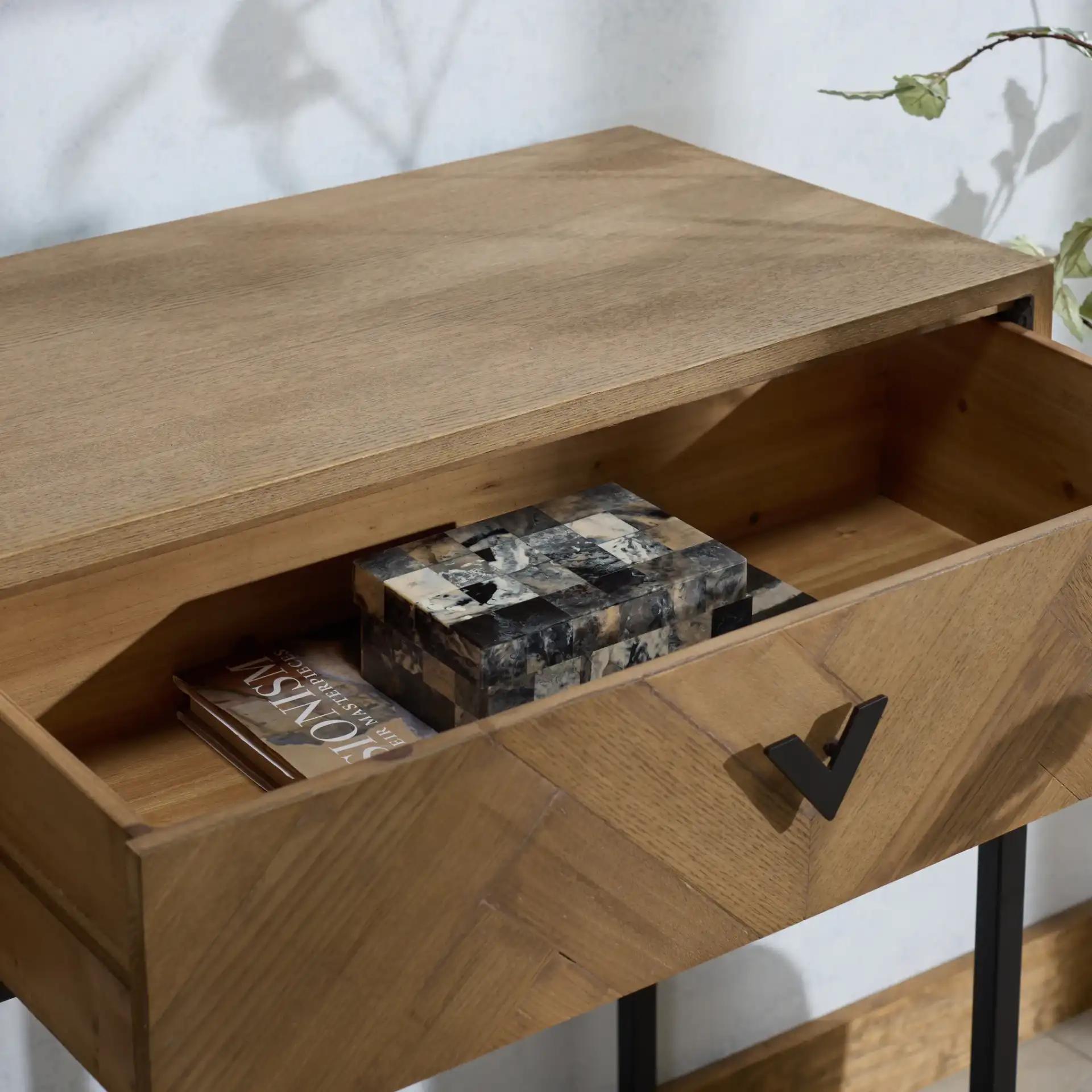 Sherriandra Two-Drawer Console in Natural / Black in a styled room