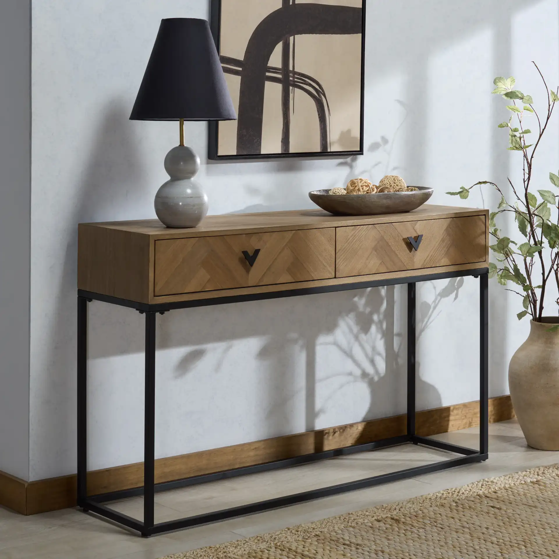 Sherriandra Two-Drawer Console in Natural / Black in a styled room