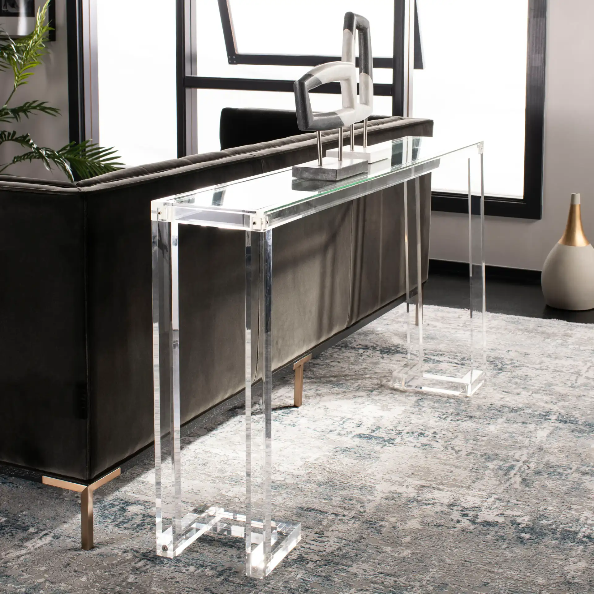 Benji Acrylic Console Table in Black in a styled room