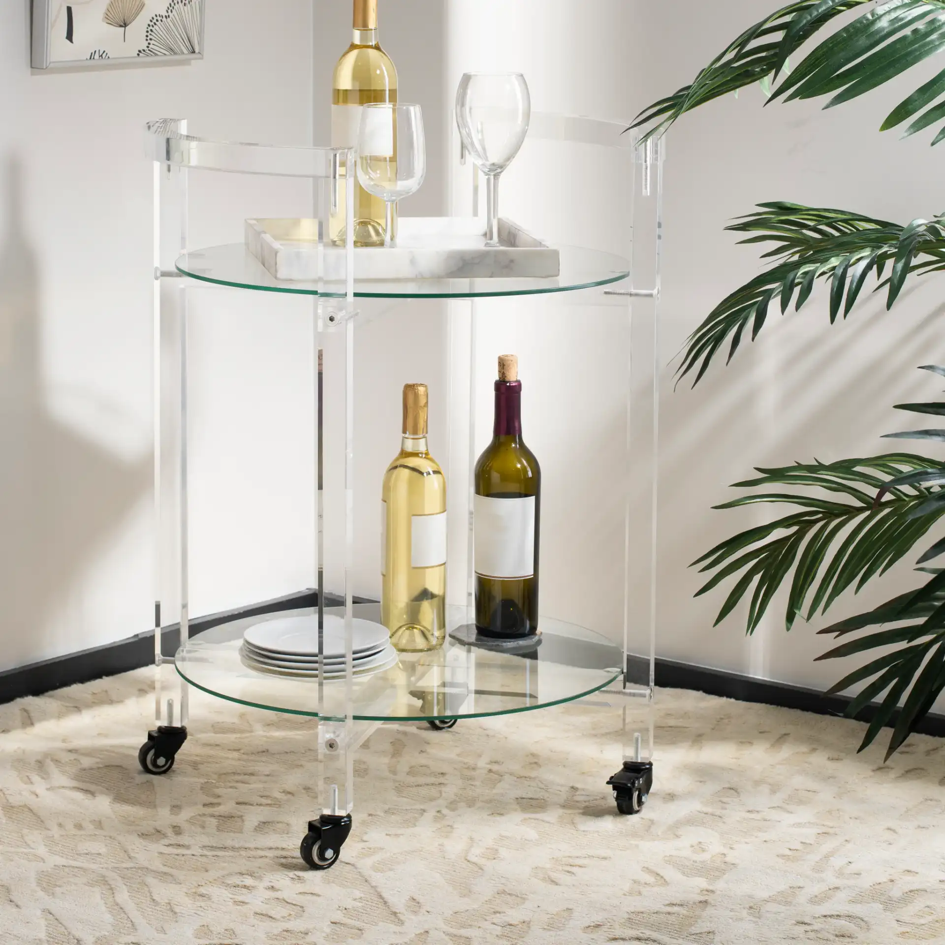 Jules Two-Tier Acrylic Bar Cart in Clear in a styled room