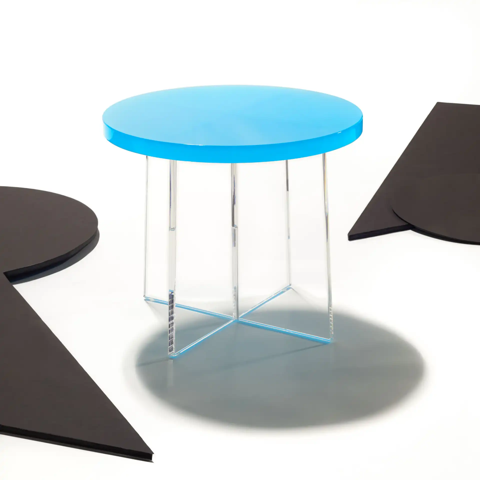 Edwards Acrylic Accent Table in Turquoise in a styled room