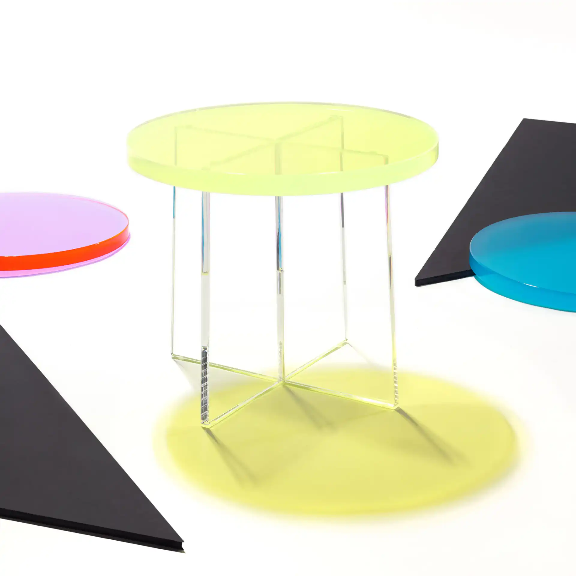 Edwards Acrylic Accent Table in Turquoise in a styled room