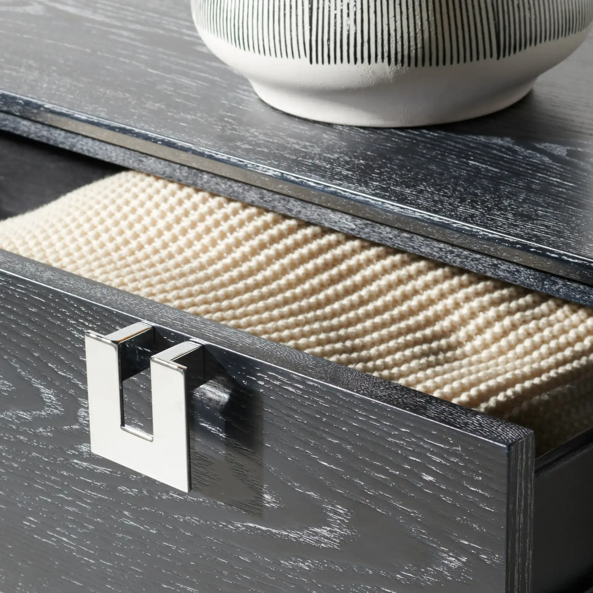 Odalis Chest Of Drawers in Black Cerused Oak in a styled room