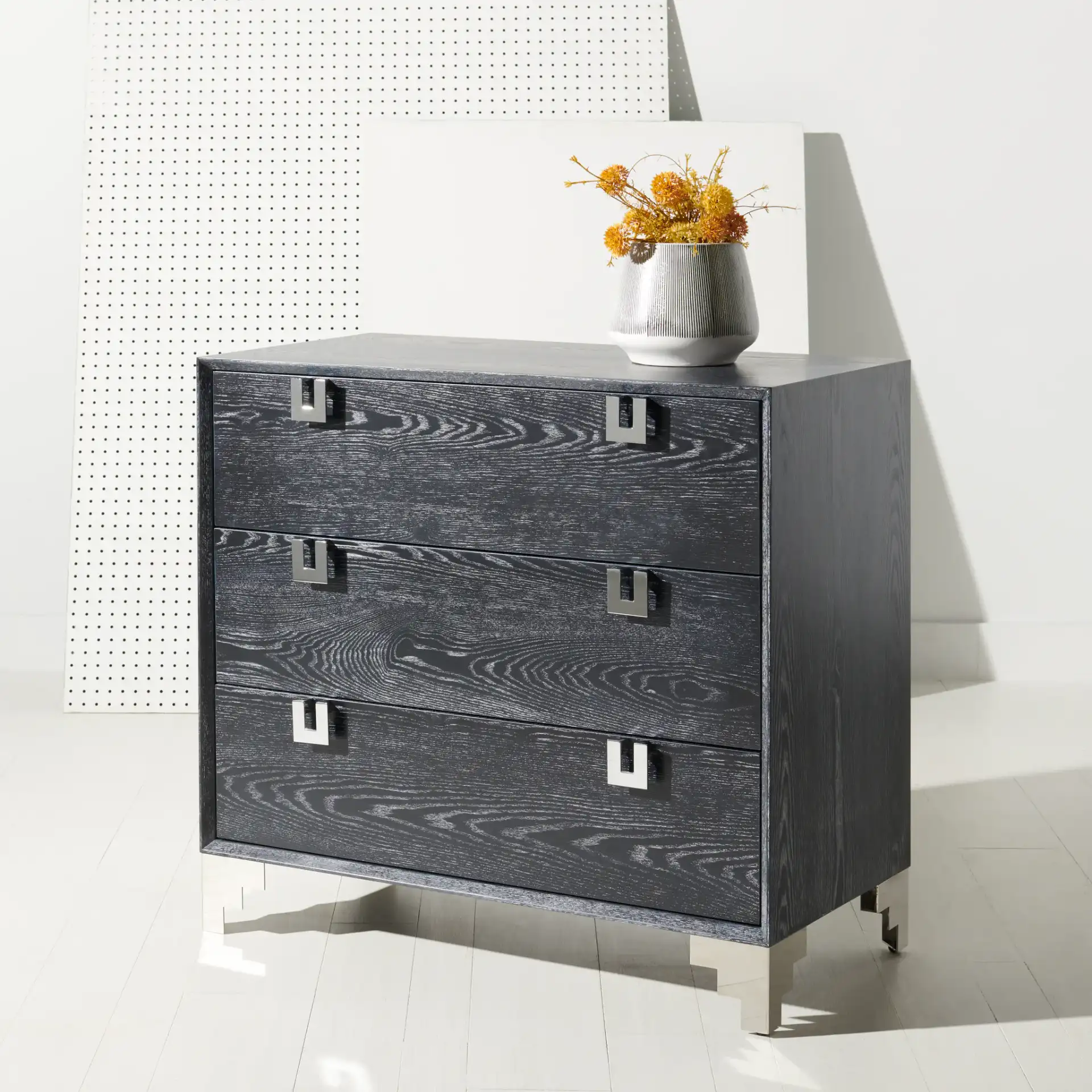 Odalis Chest Of Drawers in Black Cerused Oak in a styled room