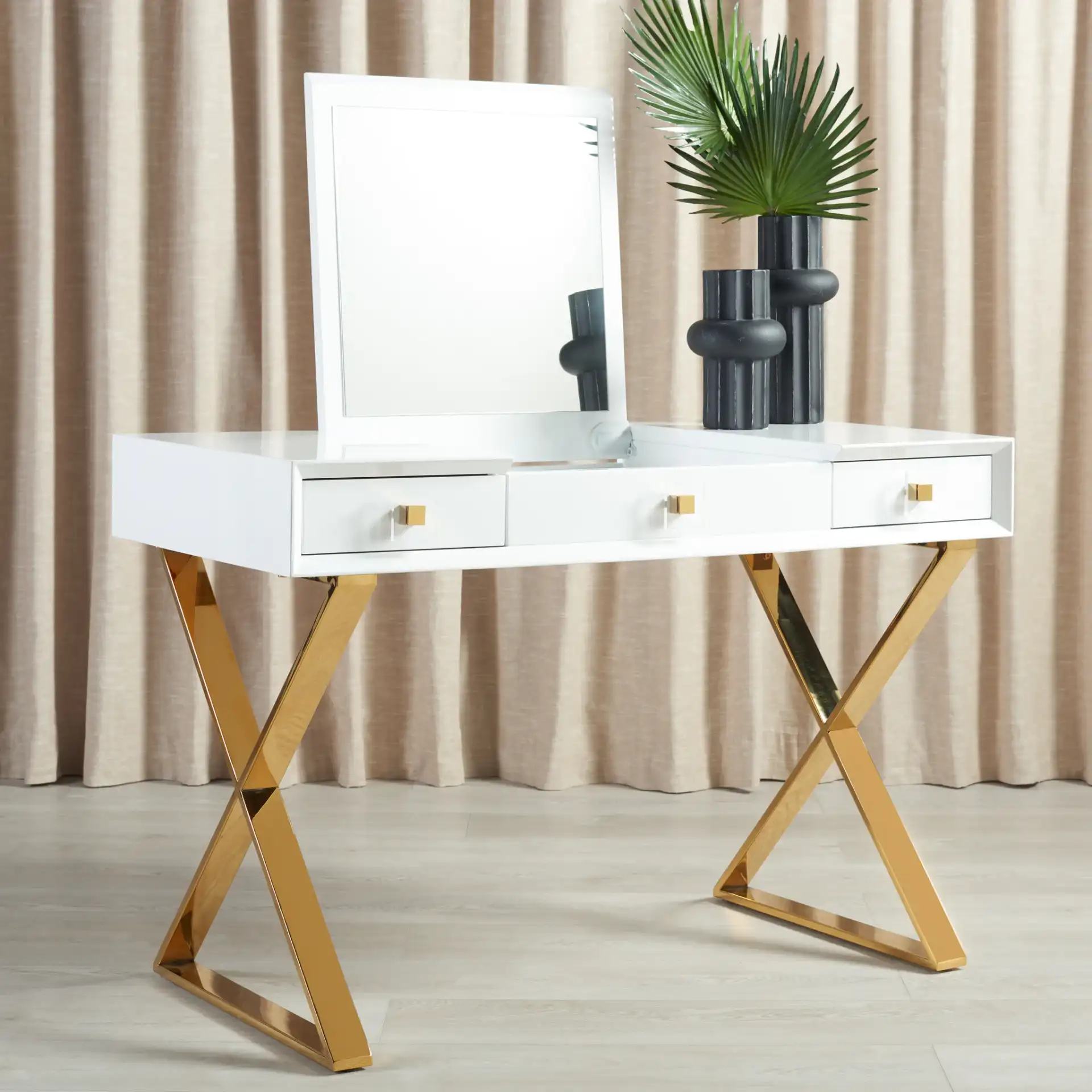 Yesenia Vanity Table in White / Gold in a styled room
