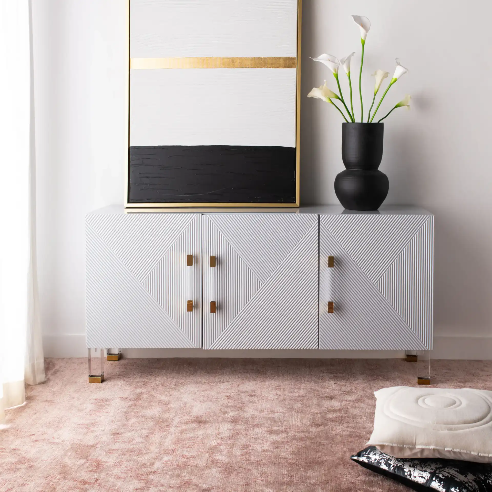 Poppy Three-Door Sideboard in Grey in a styled room