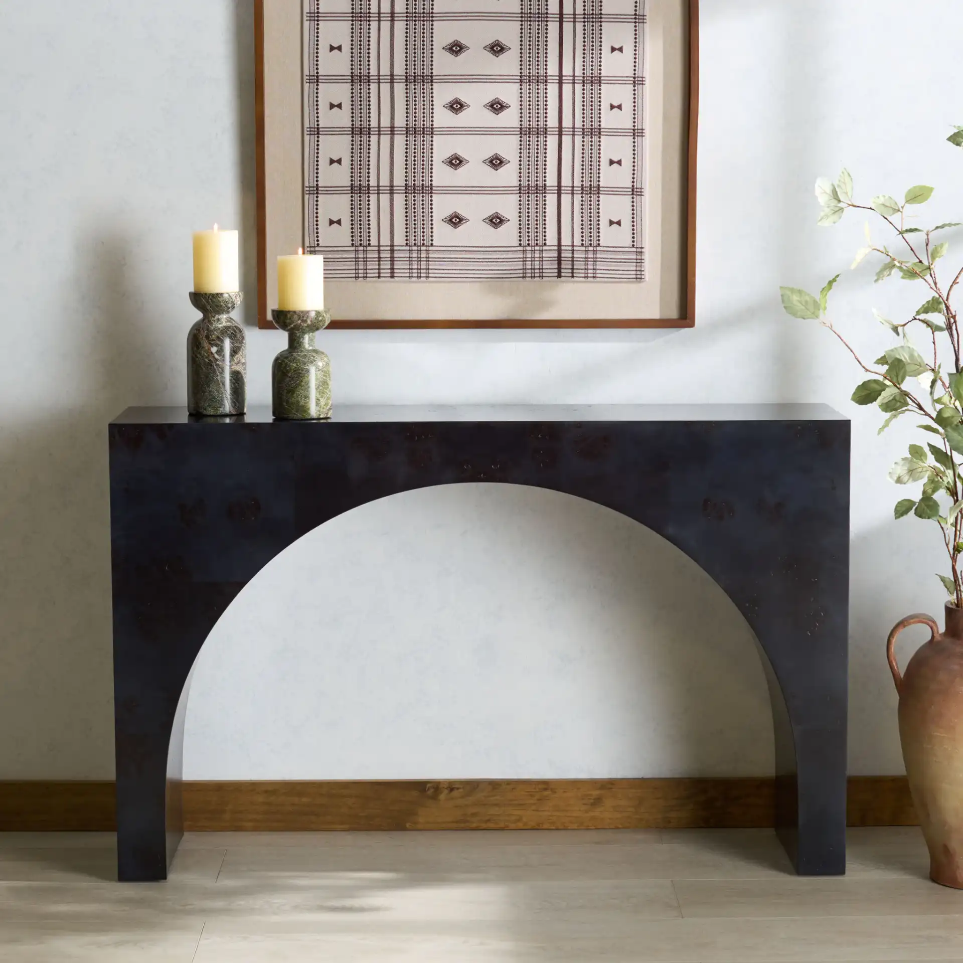 Katelynn Burled Mappa Console in Gray in a styled room