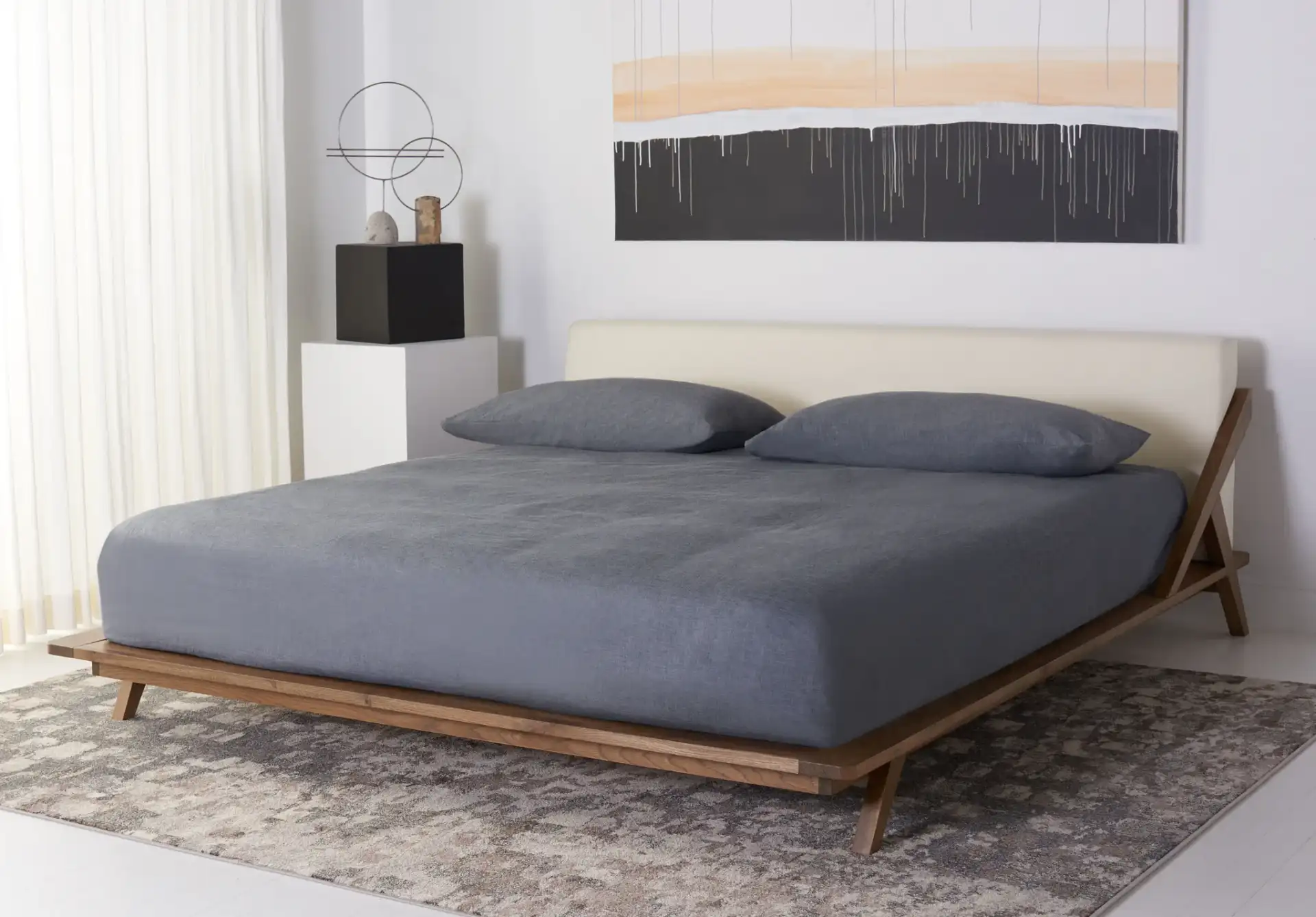 Devyn Wood Platform Bed in Light Gray / Beige in a styled room