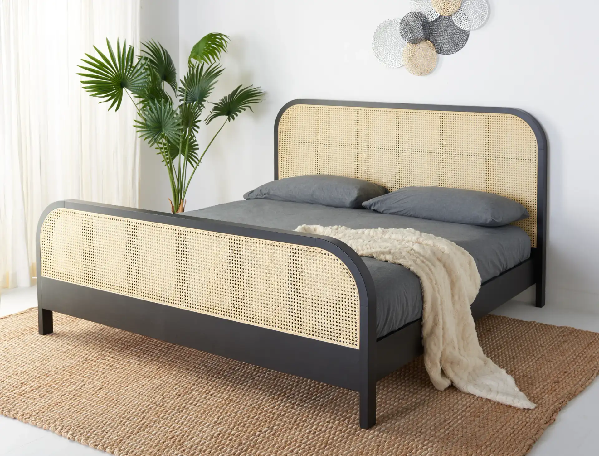 Mcallister Cane Bed in Black / Natural in a styled room