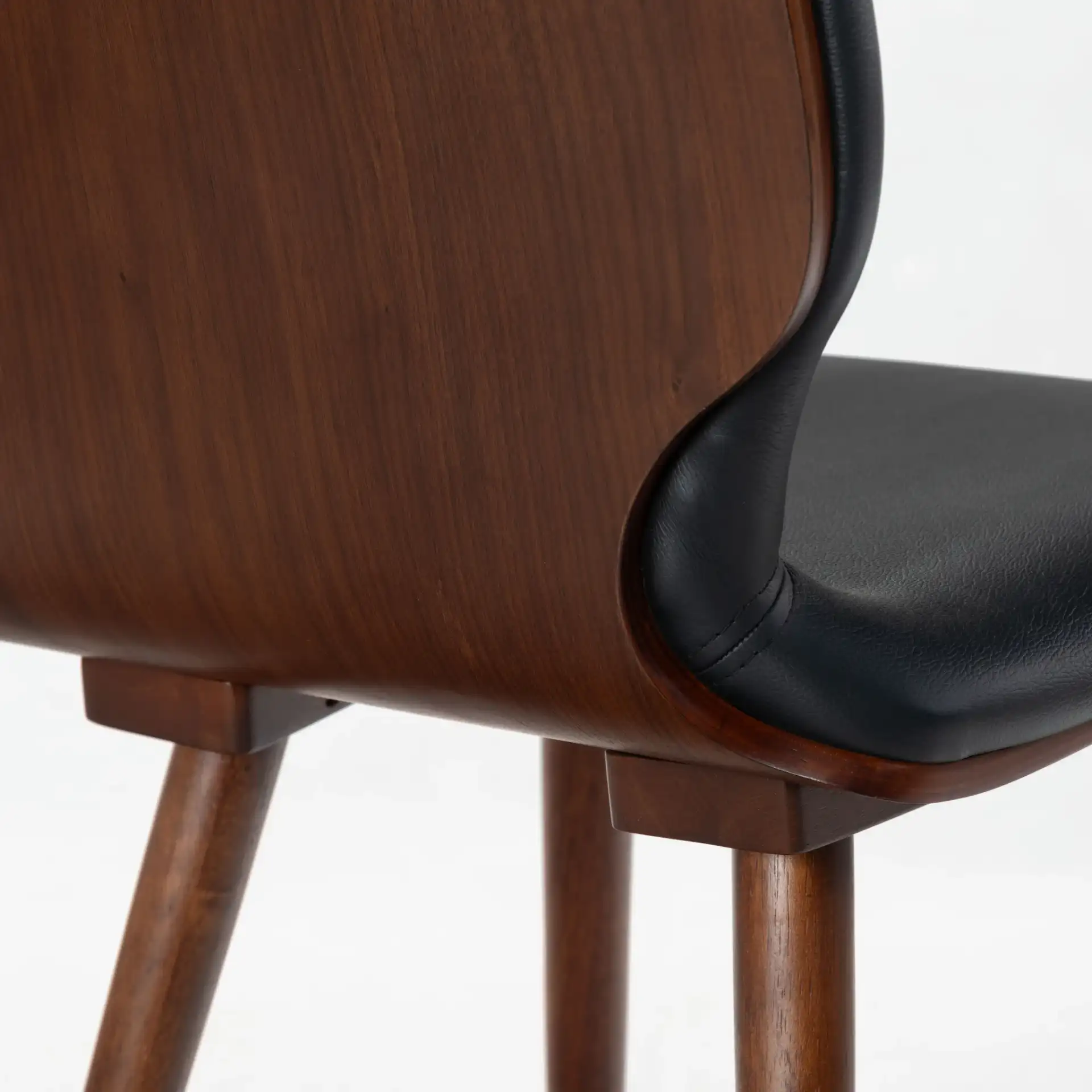 Tazmyn Dining Chair in Black / Walnut, detail view