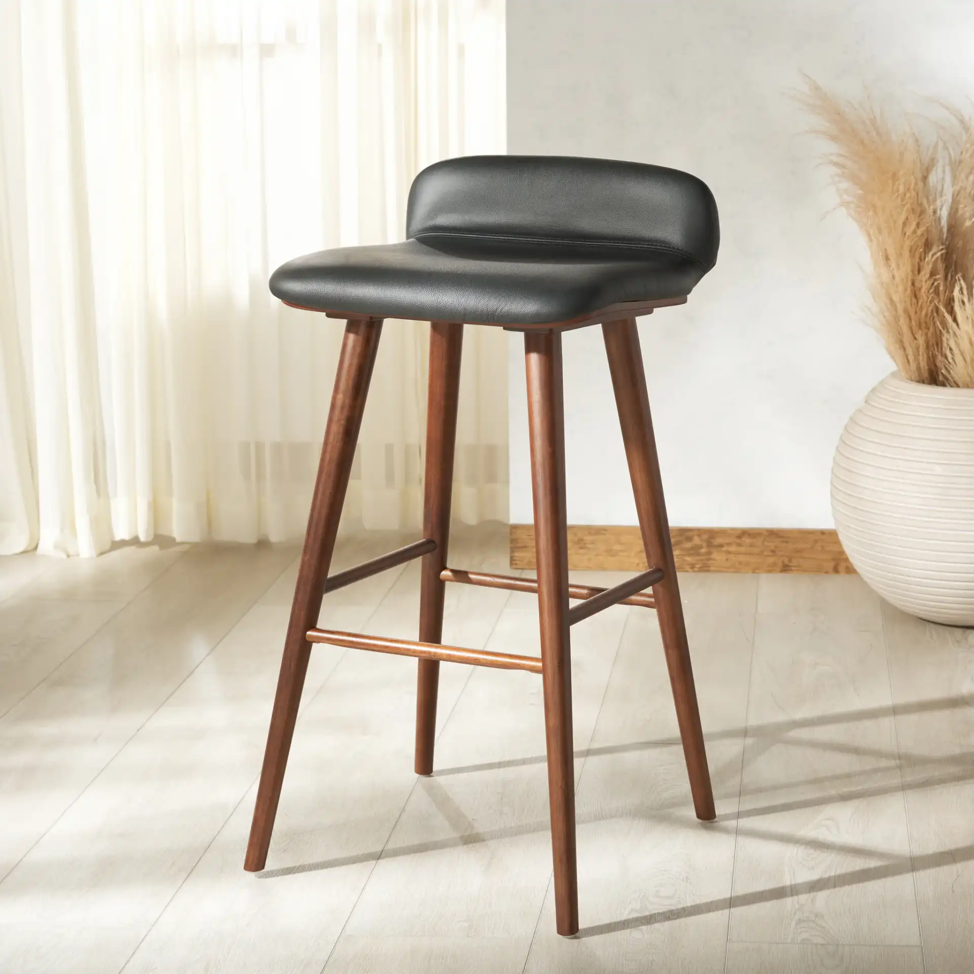 Tazmyn Barstool in Black / Walnut in a styled room