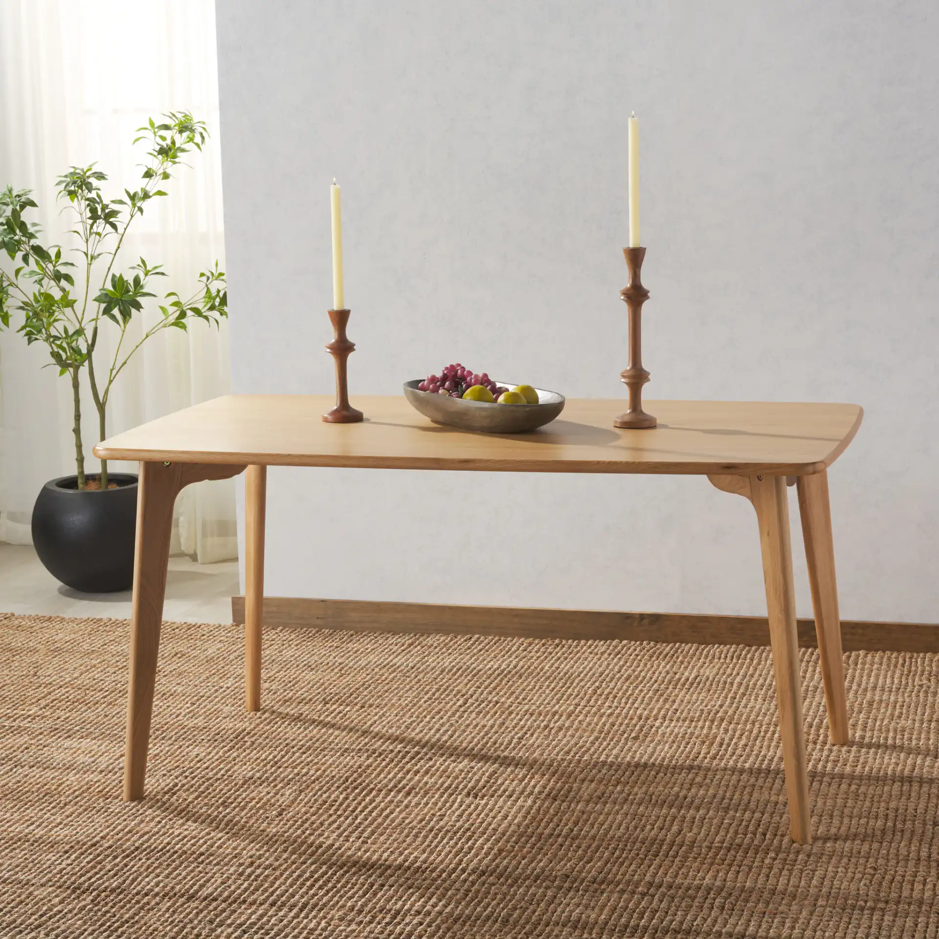 Calverton Wood Dining Table in Natural in a styled room