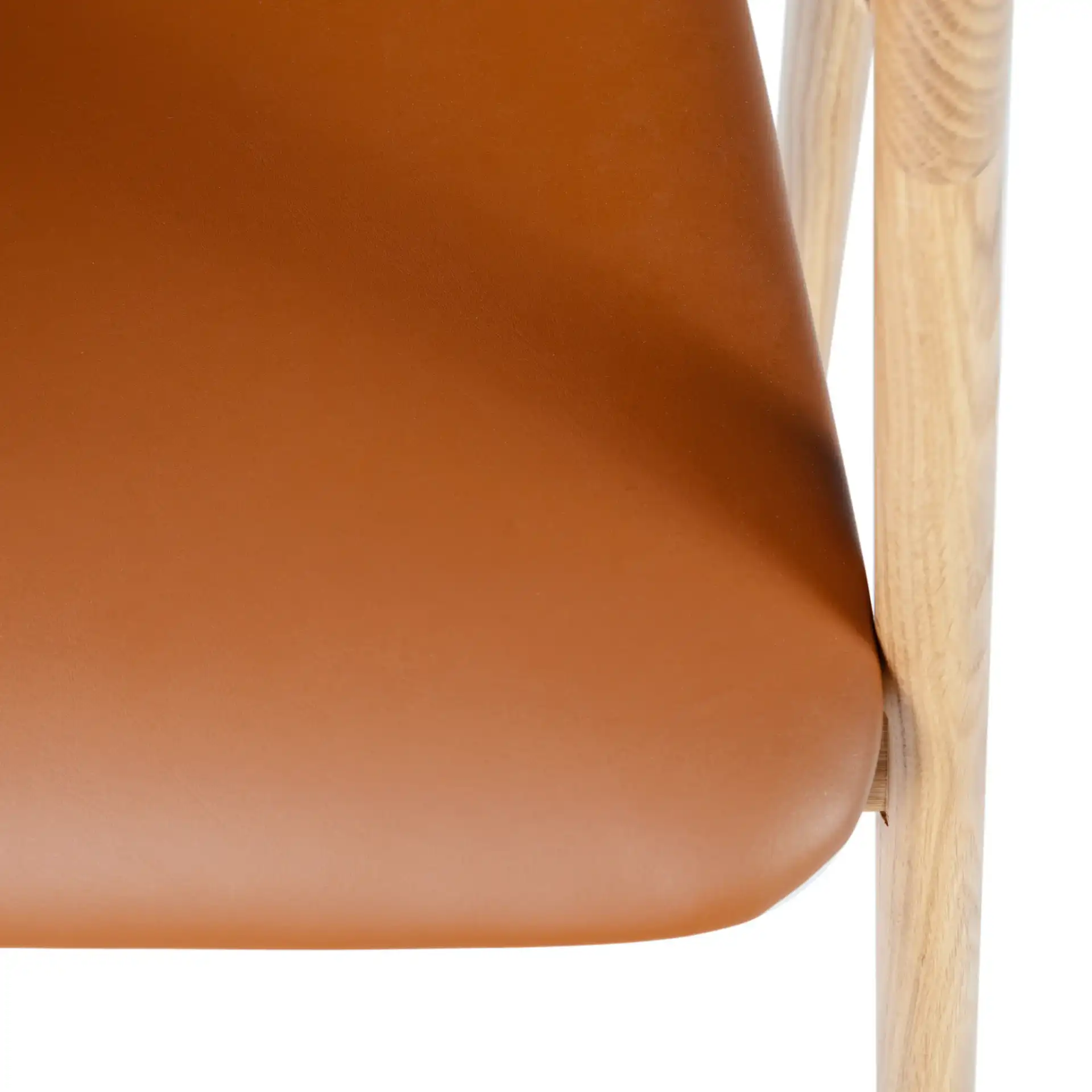 Eamon Leather Dining Chair in Natural / Brown in a styled room
