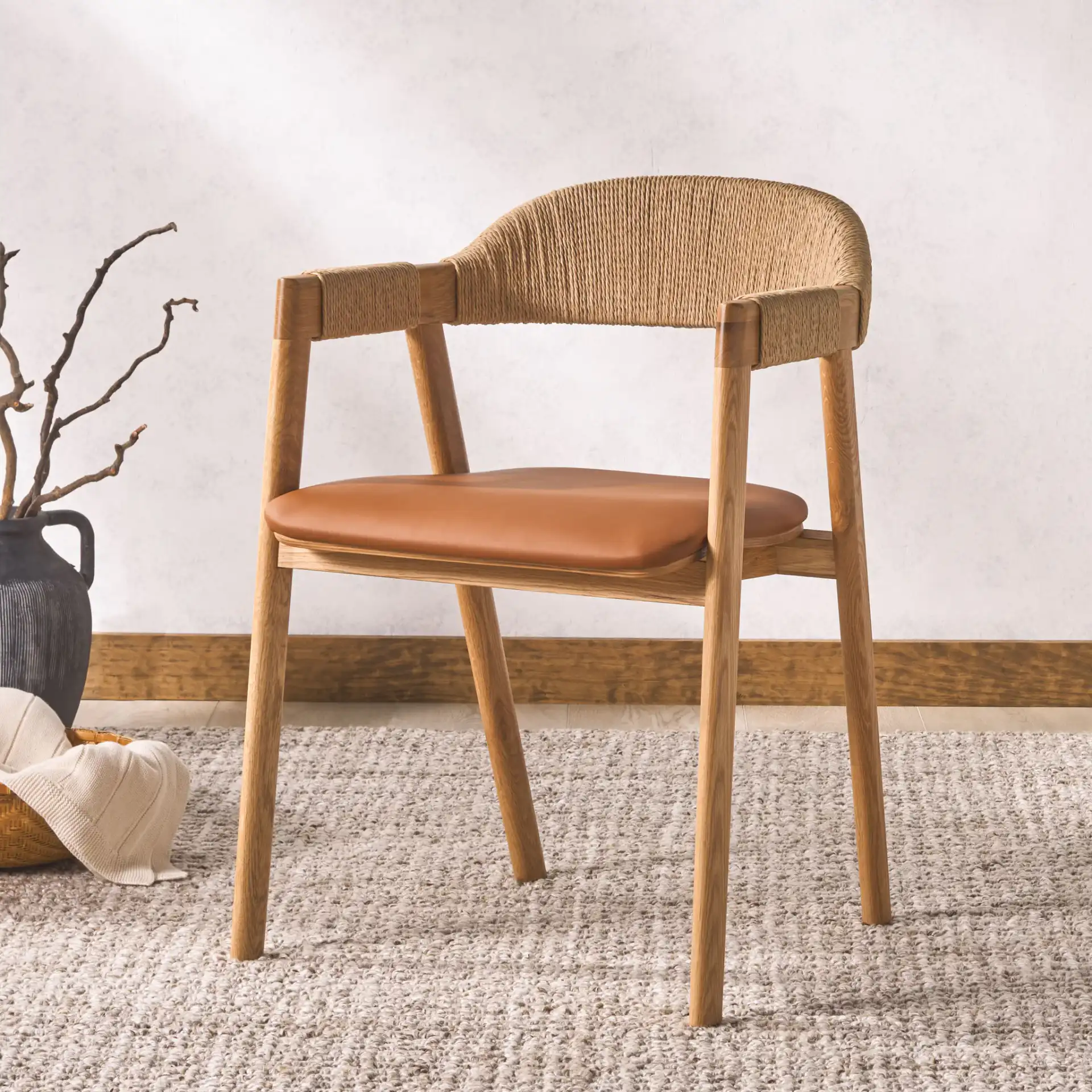 Eamon Leather Dining Chair in Natural / Brown in a styled room