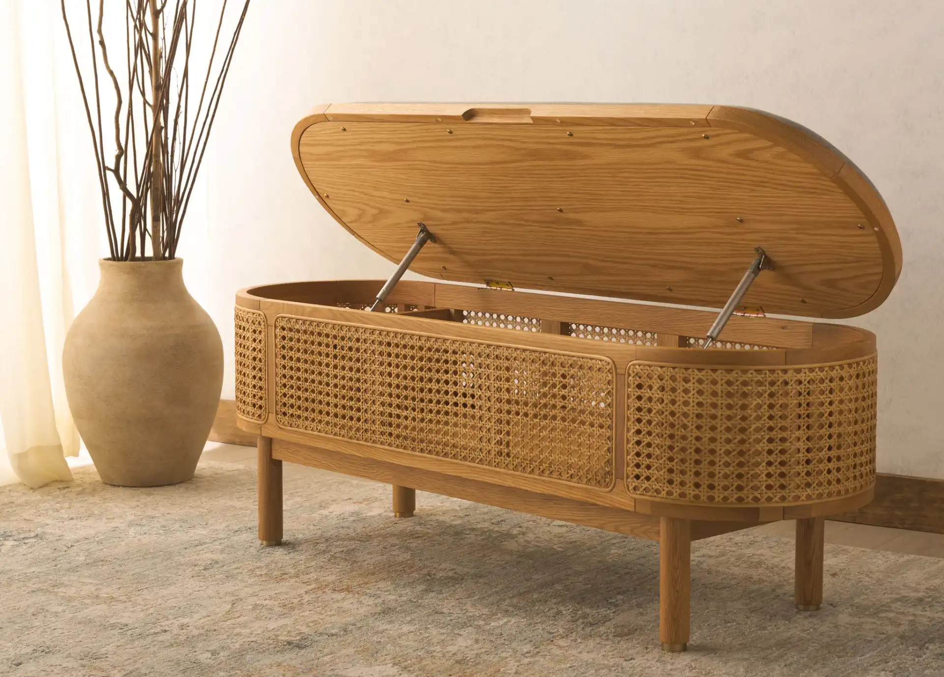 Dolly Cane And Wood Storage Bench in Natural / Gray in a styled room