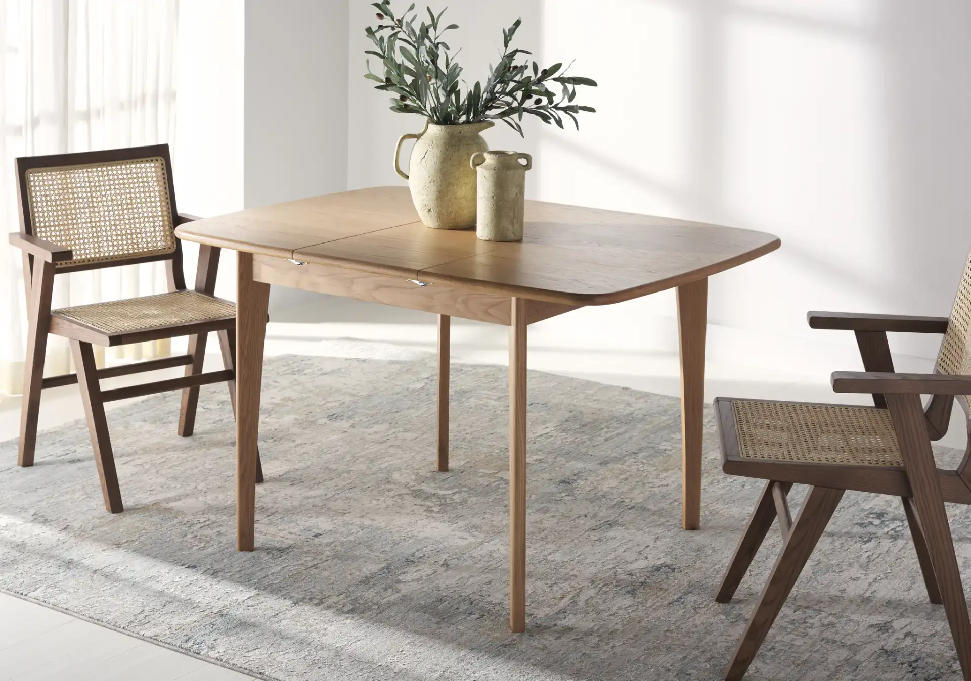 Barbossa Extendable Dining Table in Natural in a styled room
