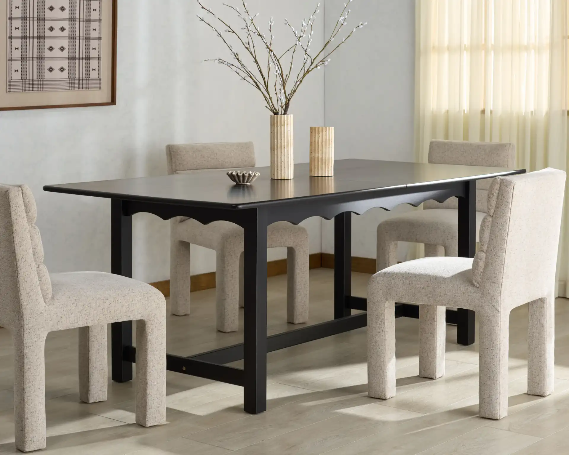 Rhylee Extendable Dining Table in Black in a styled room