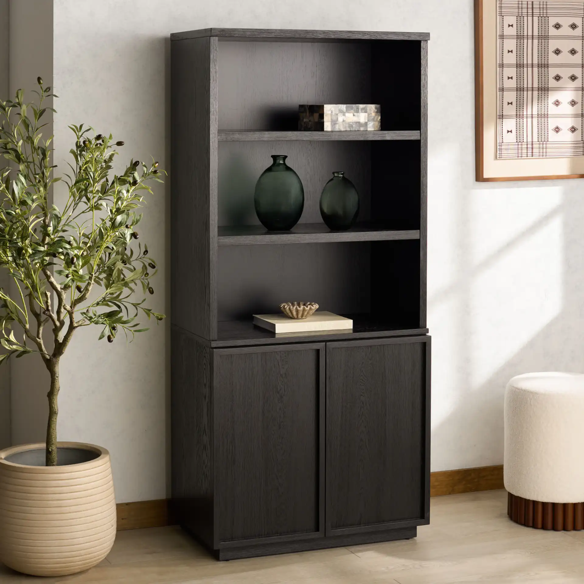 Zeus Four-Shelf Wood Bookcase in Black in a styled room