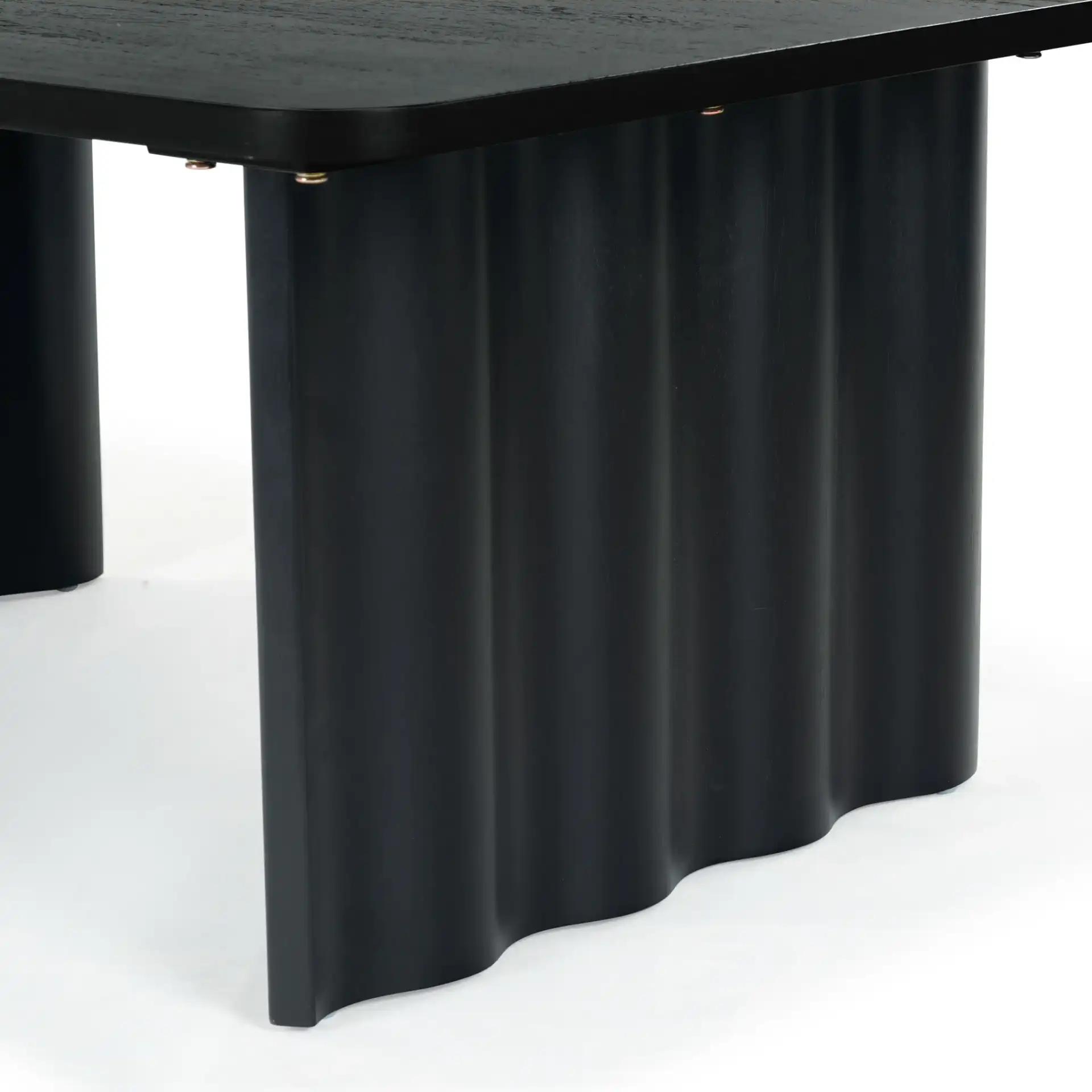 Yurina Rectangular Wood Coffee Table in Black in a styled room