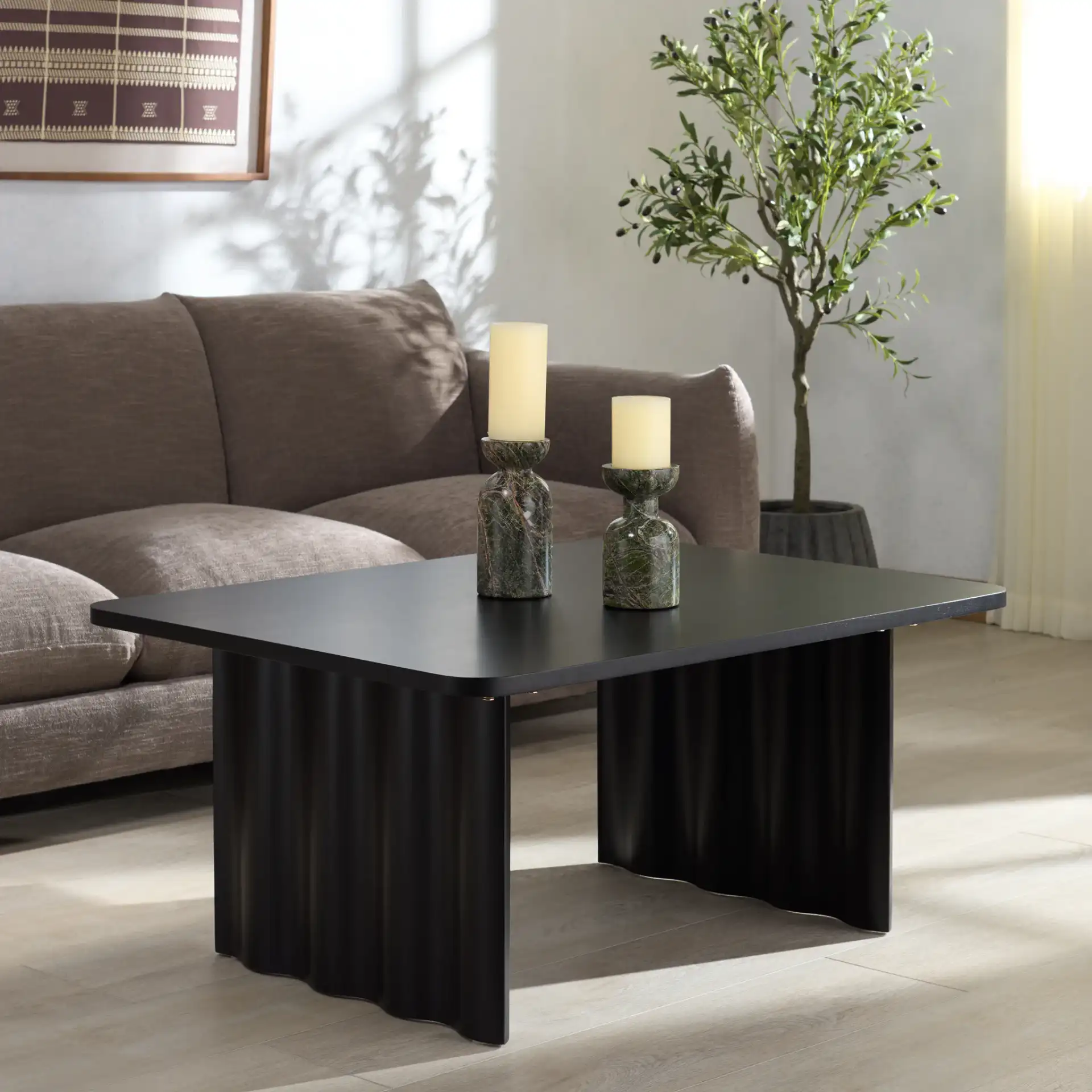 Yurina Rectangular Wood Coffee Table in Black in a styled room